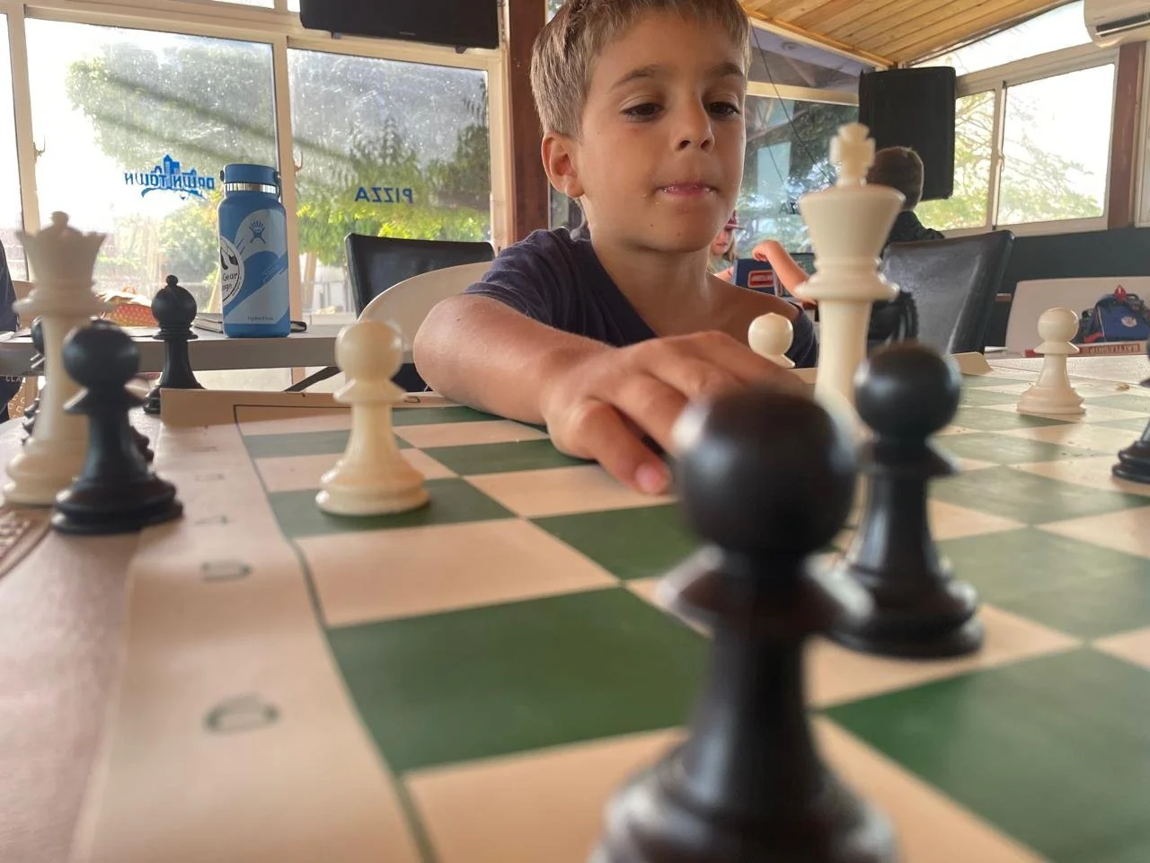 Dominican student playing chess