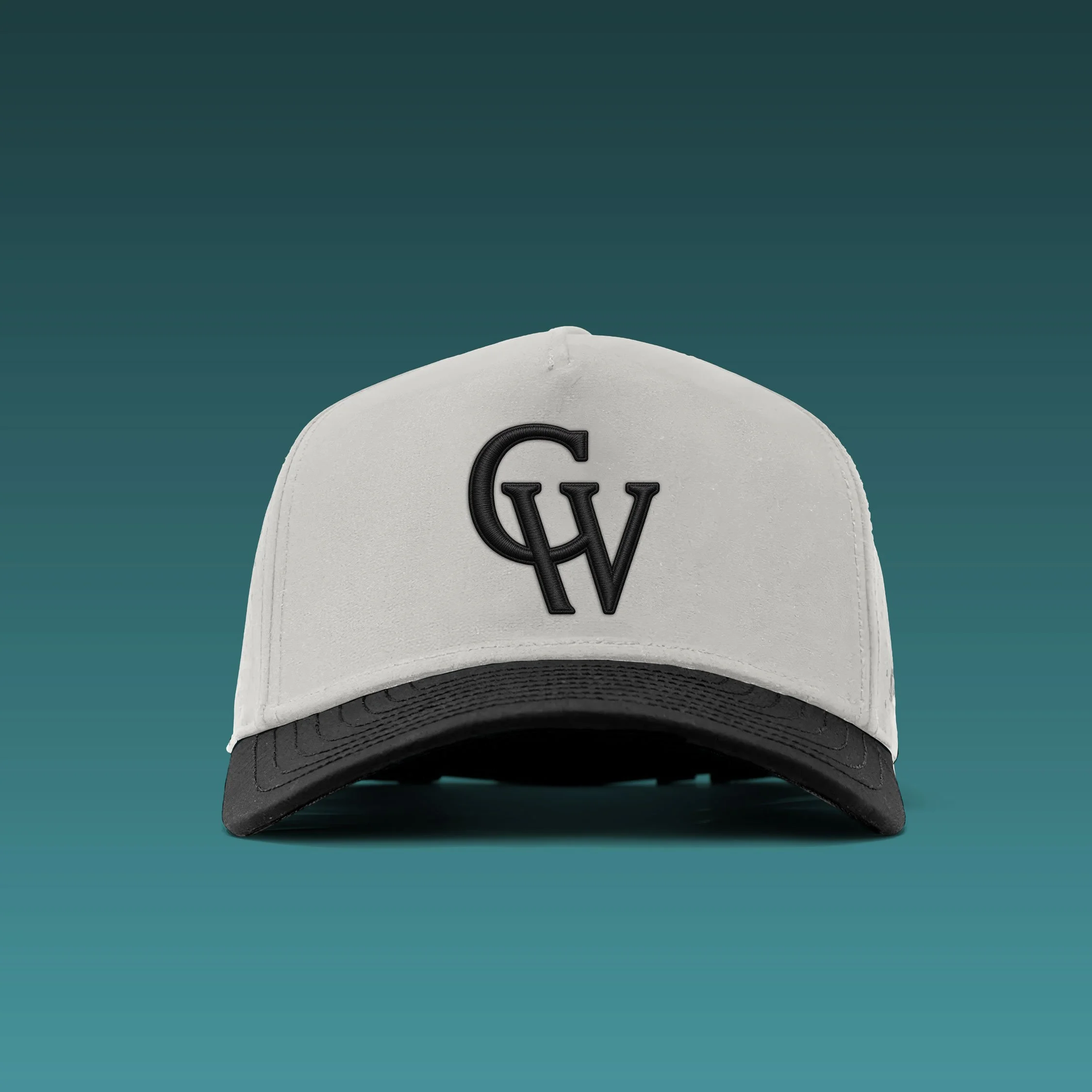 White hat with black brim and black monogram logo in puff embroidery