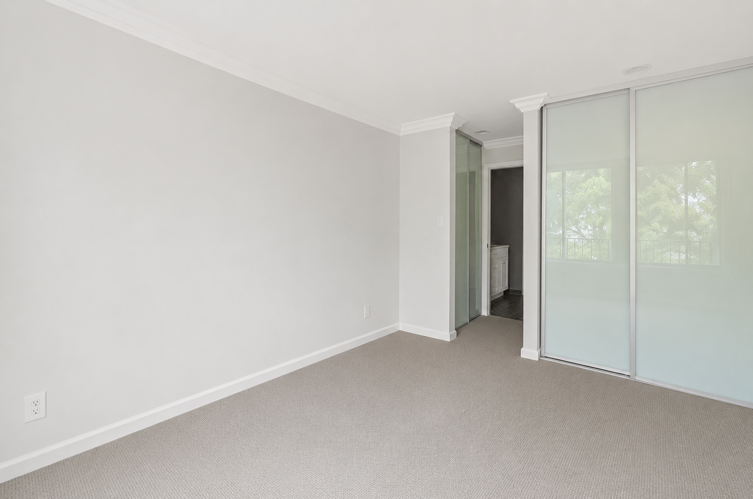 Bedroom entrance + closet space (photo taken 3 years ago; staging removed by AI)