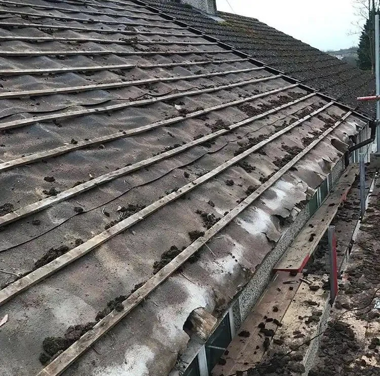 Removal of leaking roof ready for new roof