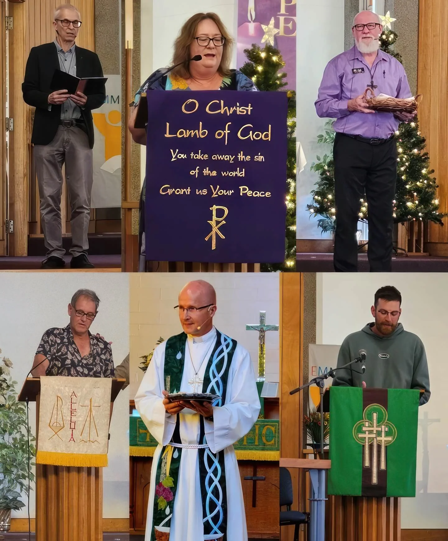 Group of religious leaders and congregation members participating in a Christian church service, with Christmas decorations including Christmas trees in the background.