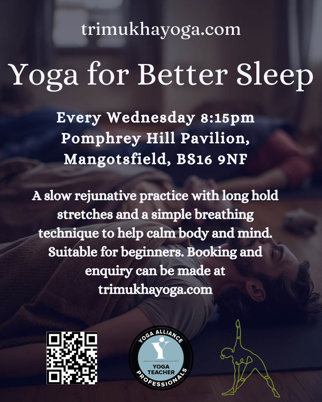 A man with a beard and tattoos on his left arm sitting on a yoga mat, stretching in a seated twist position with his left hand raised and looking to his left, in a room with white walls and wooden floor.