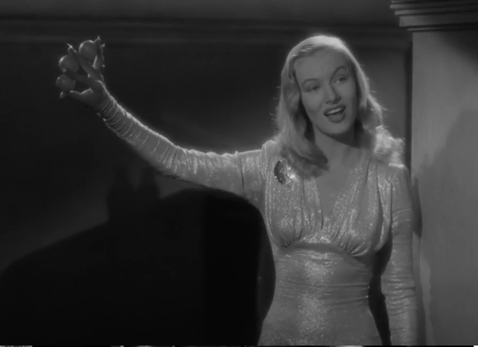 Veronica Lake in an incredibly sparkly dress, mid song, holding three balls in one hand because she's been making them appear WITH MAGIC (allegedly)
