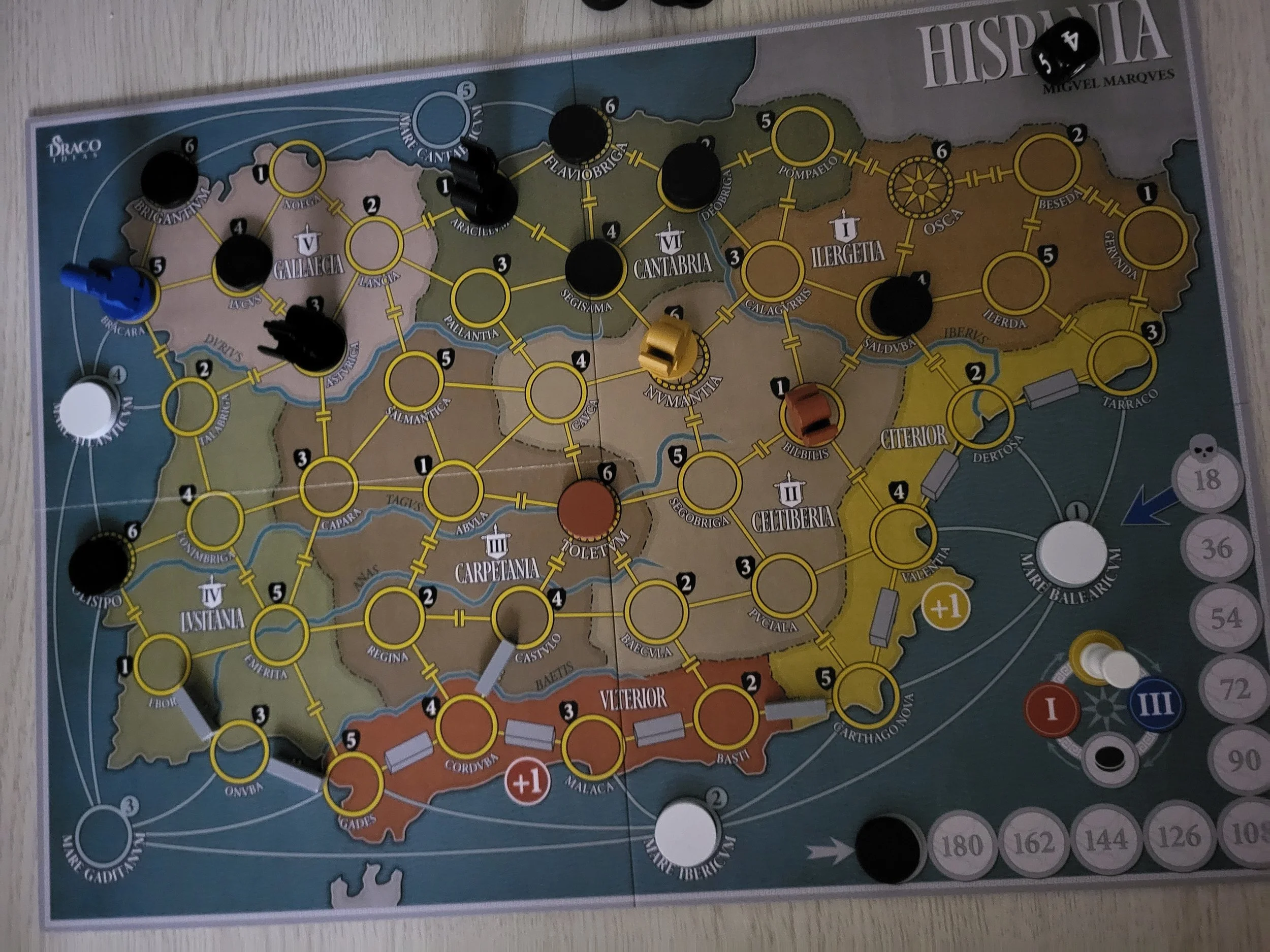 A photo of the board during a game of Hispania