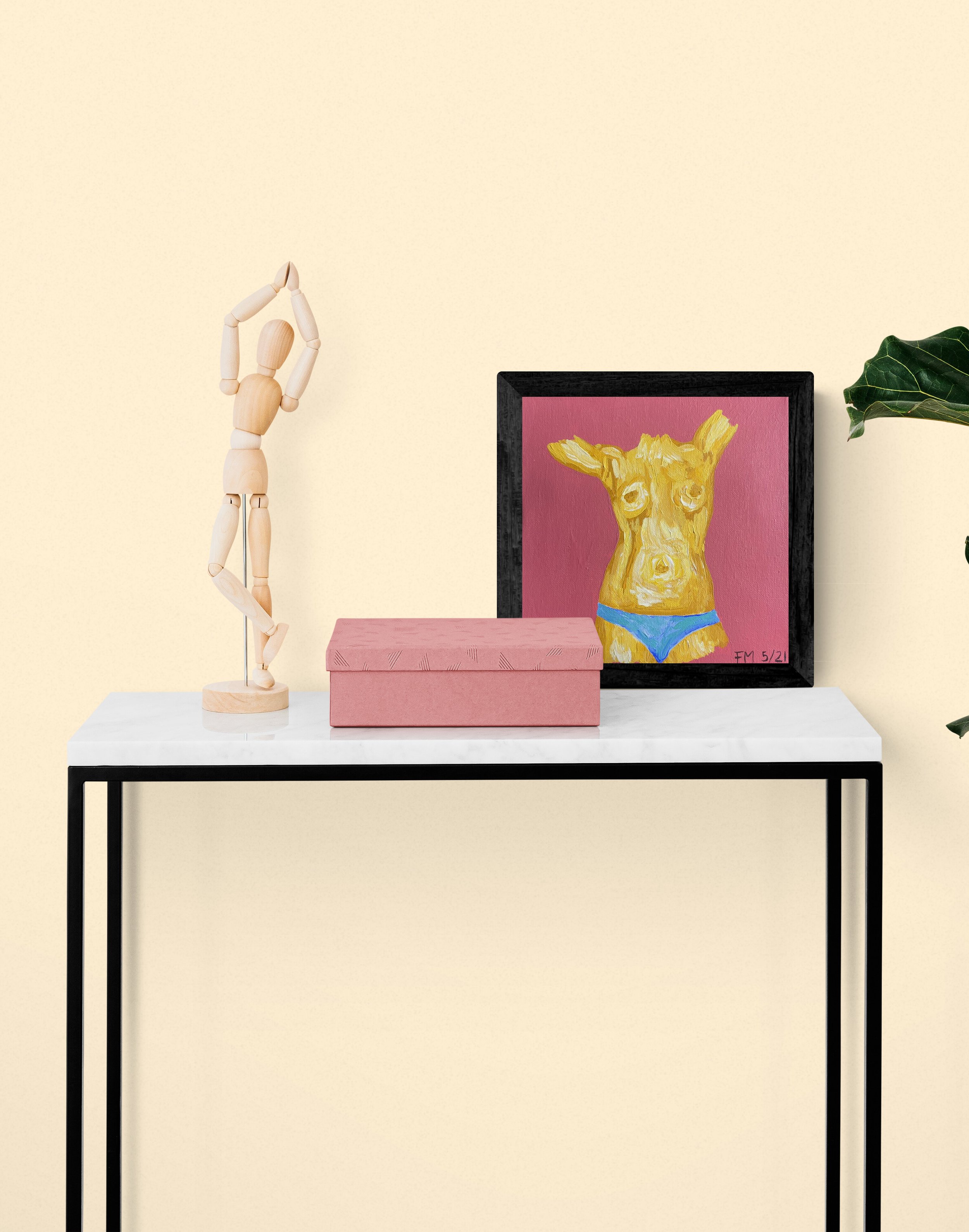 Wooden_mannequin_and_box_on_table.jpg