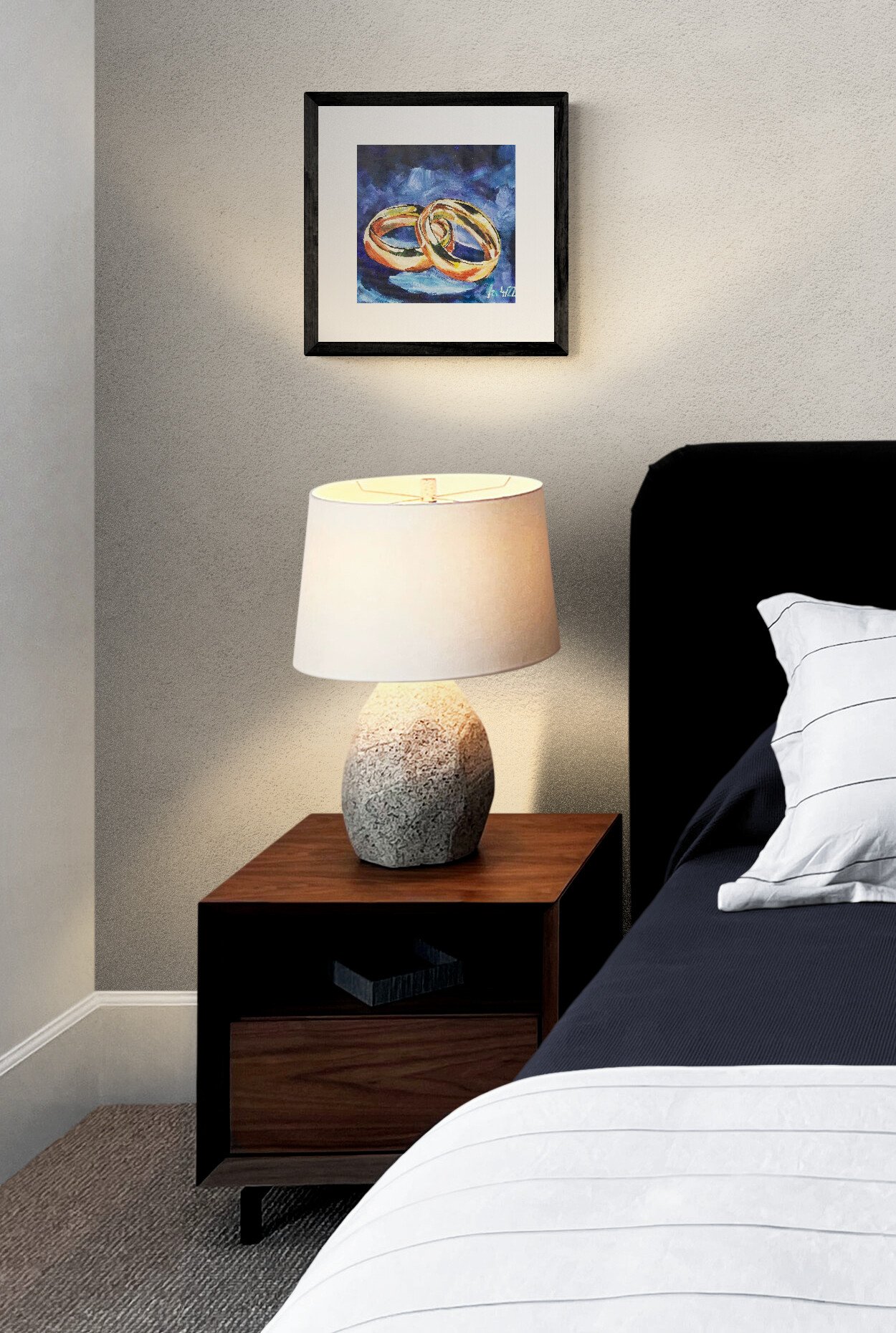 This art print is a perfect gift idea for a newly-wed couple close to your heart. The shiny gold colour of the rings just pops perfectly on the dark blue background.