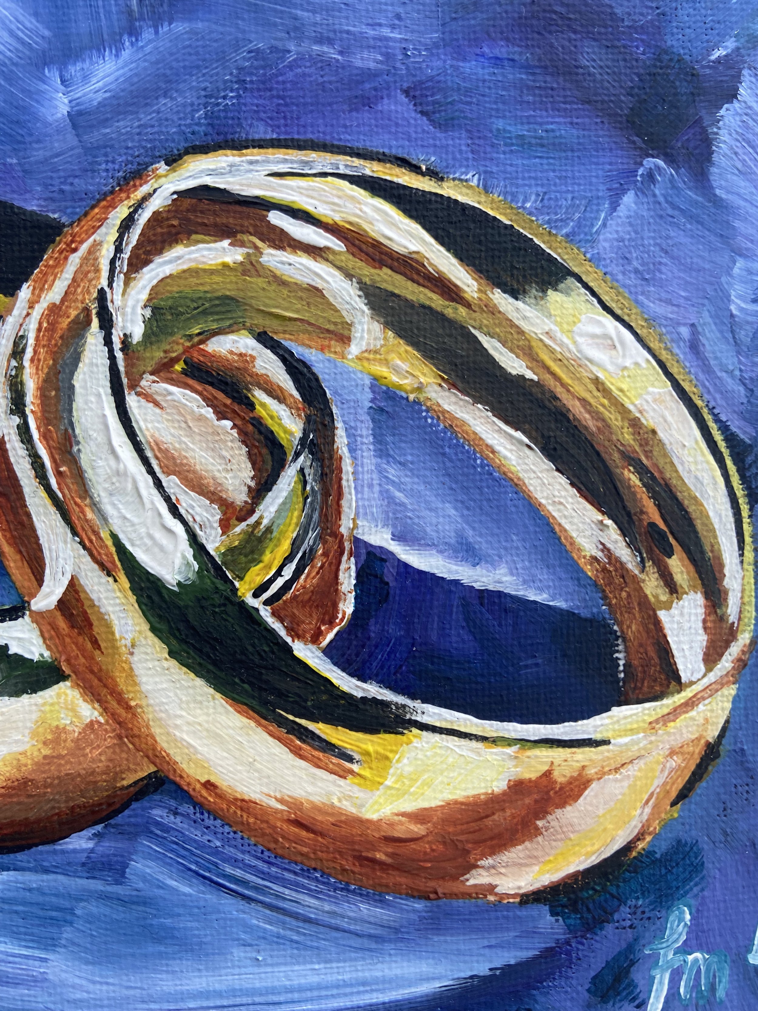 This art print is a perfect gift idea for a newly-wed couple close to your heart. The shiny gold colour of the rings just pops perfectly on the dark blue background.