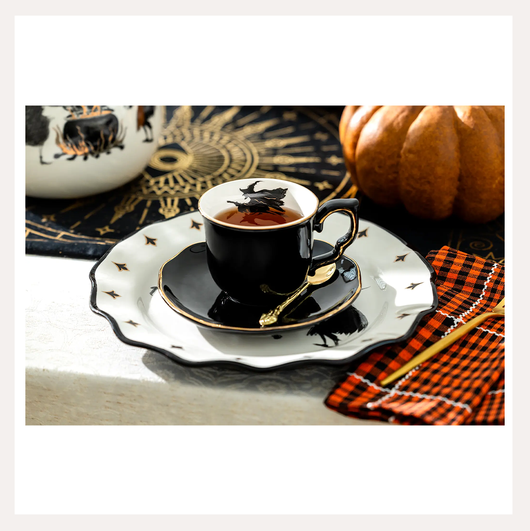 flying witch tea cup 2.png