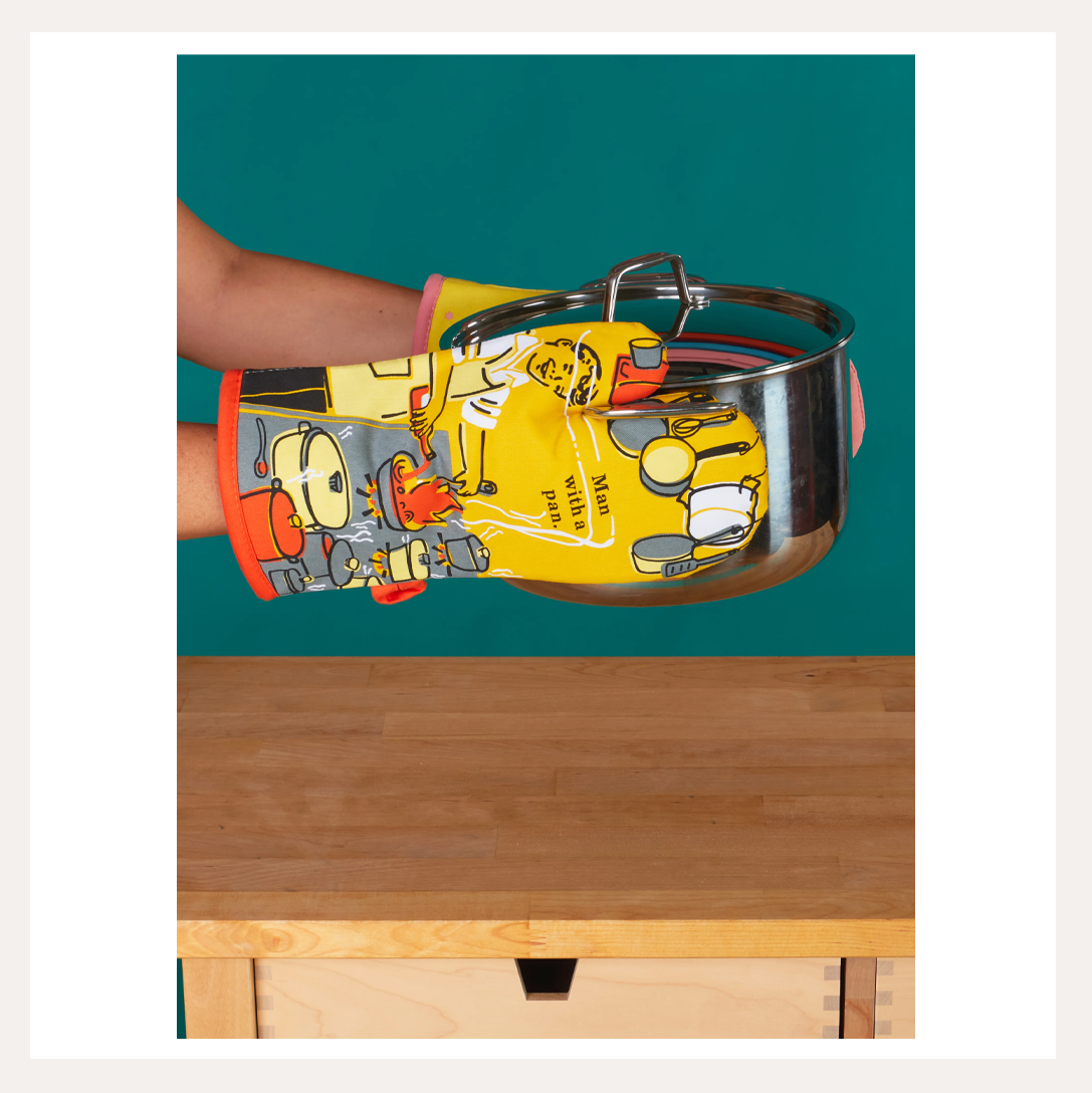 man with a pan oven mitt 5.png