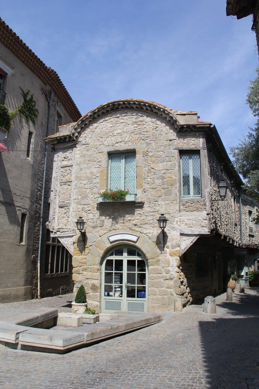 Summer 2016: Visiting family in France. This is in the medieval city of Carcassonne. Fun fact: those overhangs are because owners were taxed based on the ground floor foot print, not necessarily square overall square footage.