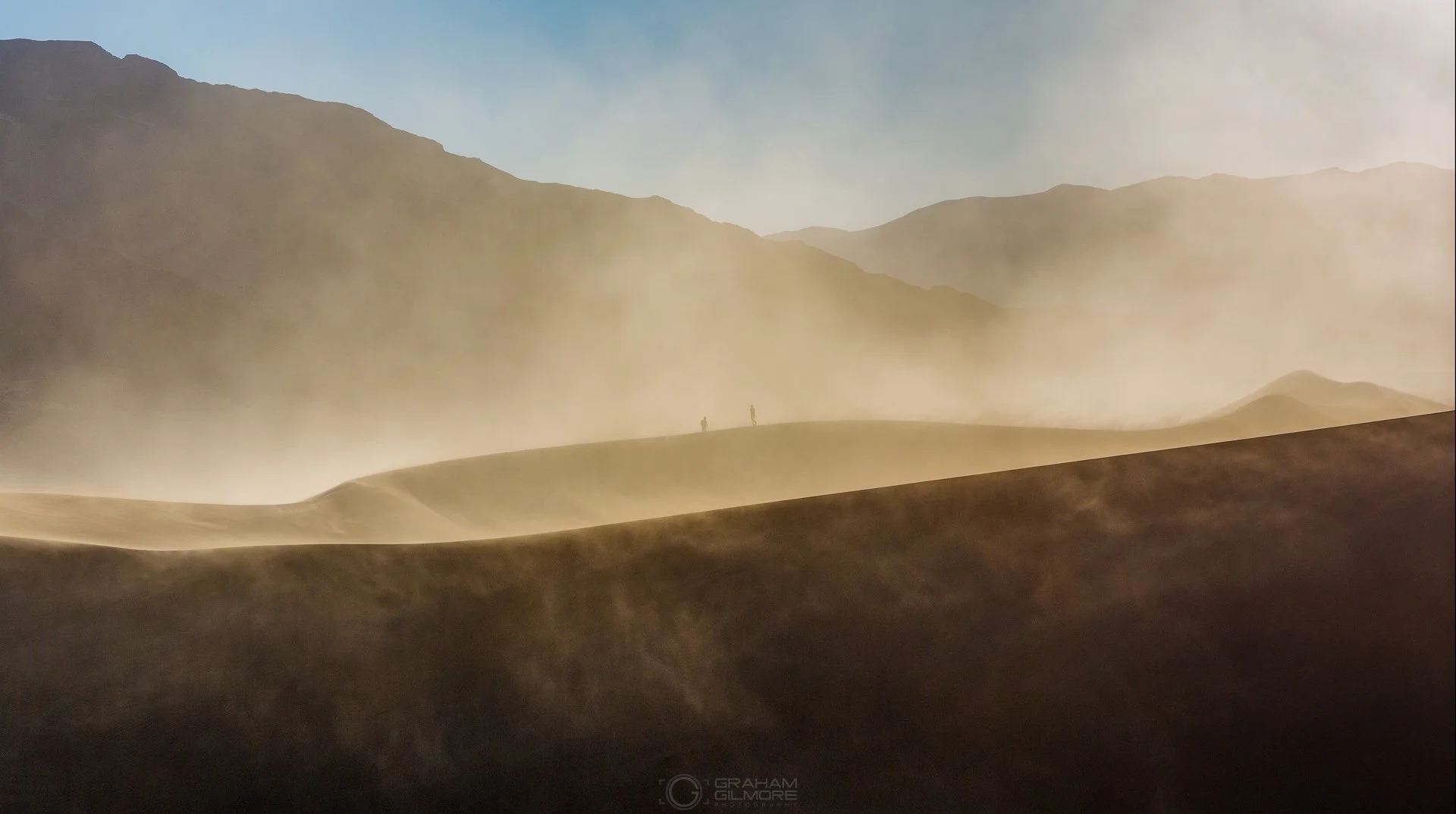 Hikers in the Sand Storm Mesquite Flats Death Valley.jpg