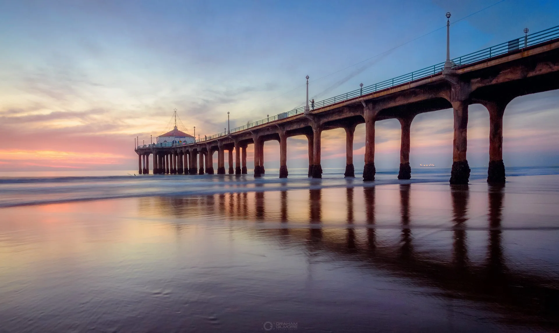 Manhattan pier misty sunset pastel sky soft water.jpg