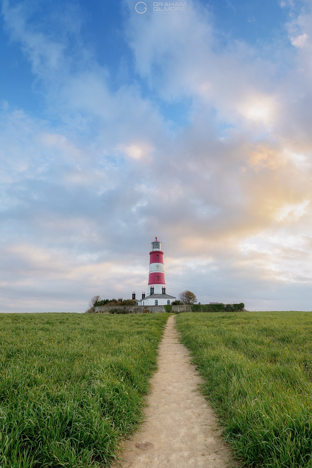 Happisburgh Lighthouse at Sunset Norfolk England Golden Clouds.jpg