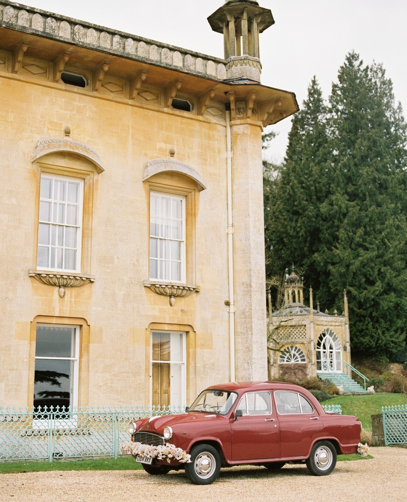 Wouldn't this be the cutest car to leave in from your wedding?  All the details at Sezincote House were perfect.⁠
⁠
shot on Fuji film⁠
⁠
Venue: Sezincote House @camillajpeake ⁠
Workshop Host: AMV Retreats @amv_retreats⁠
Wedding Planner, Styling + Des