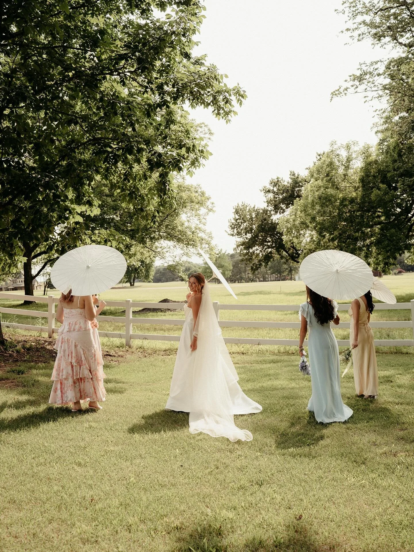 Pastels, parasols, and the kind of love that never goes out of style 🤍 Katie looked truly breathtaking in her stunning gown, perfect for a day filled with light and joy.

Congratulations to Katie &amp; Tate✨

Bride | @katietrammel0531 
Photography |