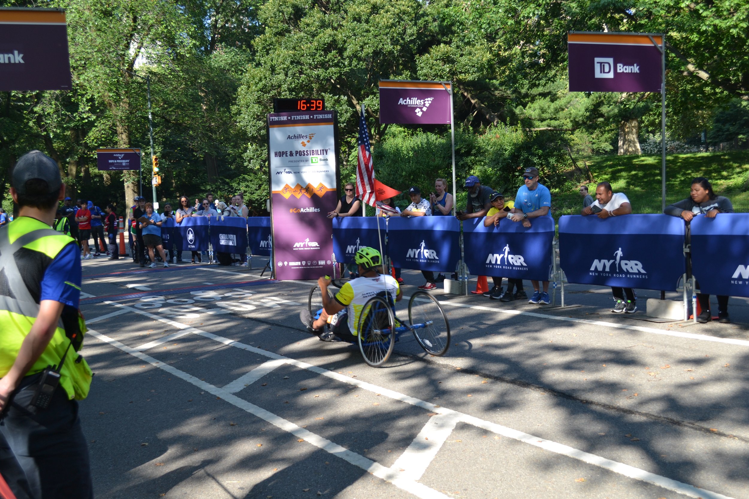  Handcycle athlete crossing the Hope and Possibility Finish Line 