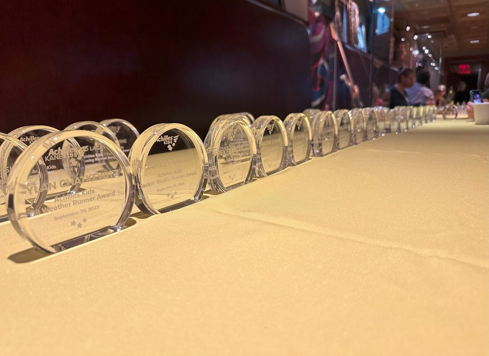  All the awards lined up at the Achilles Kids Awards DInner 