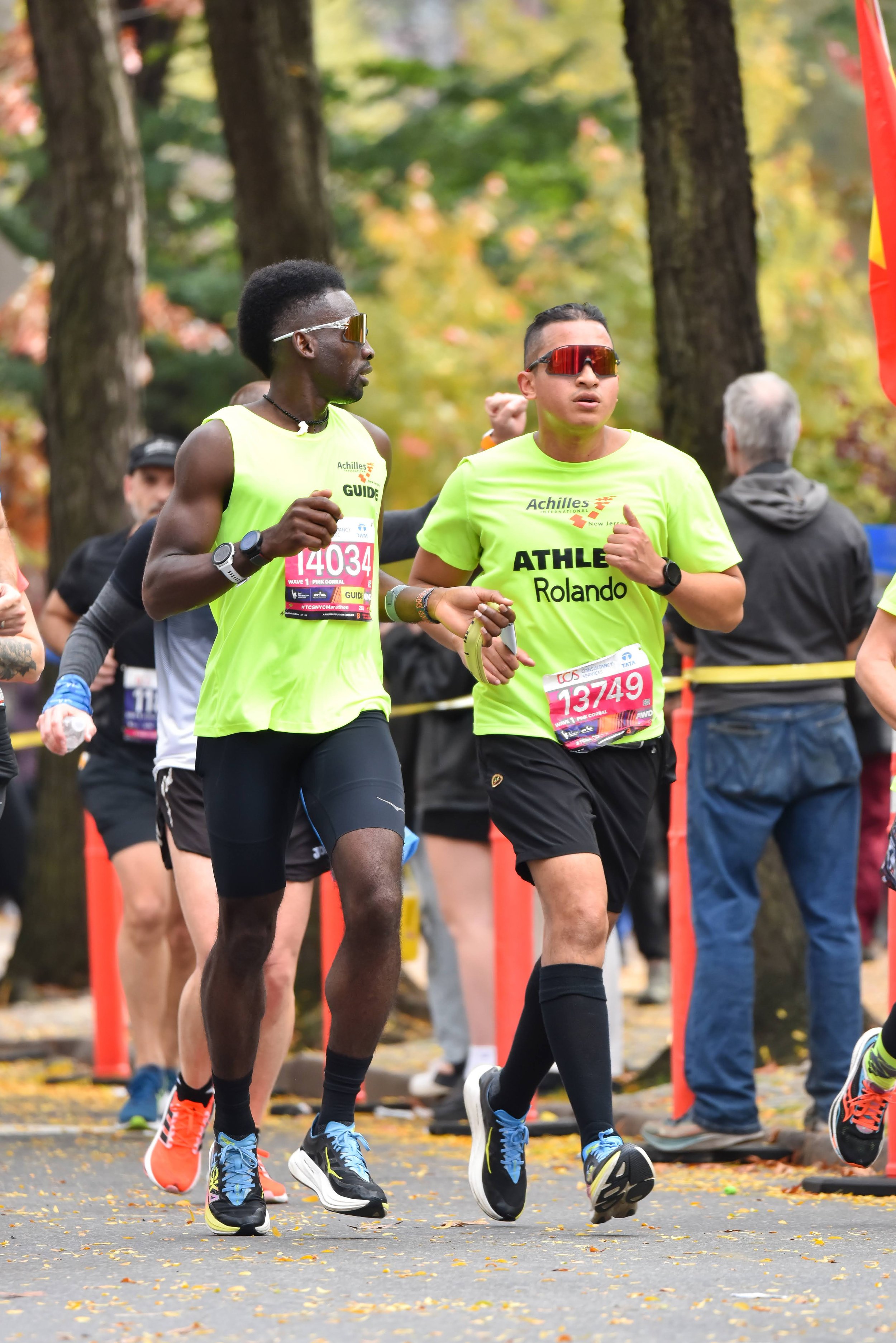  Rolando Lee and Hellah Sidibe running together on the course  