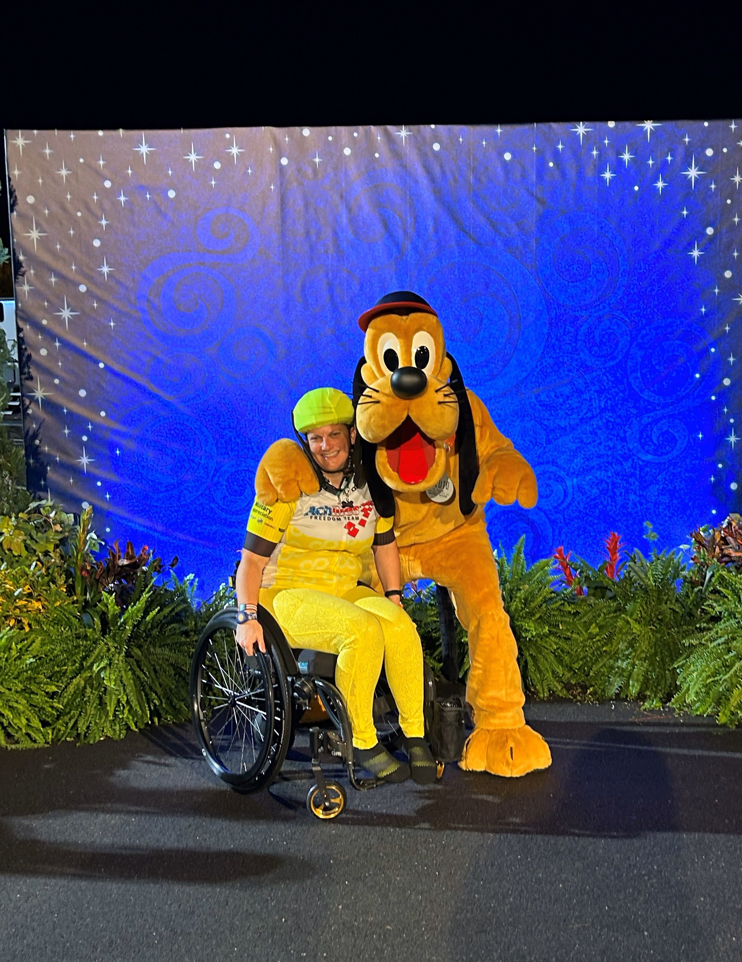  Achilles Freedom Team member posing with Goofy 