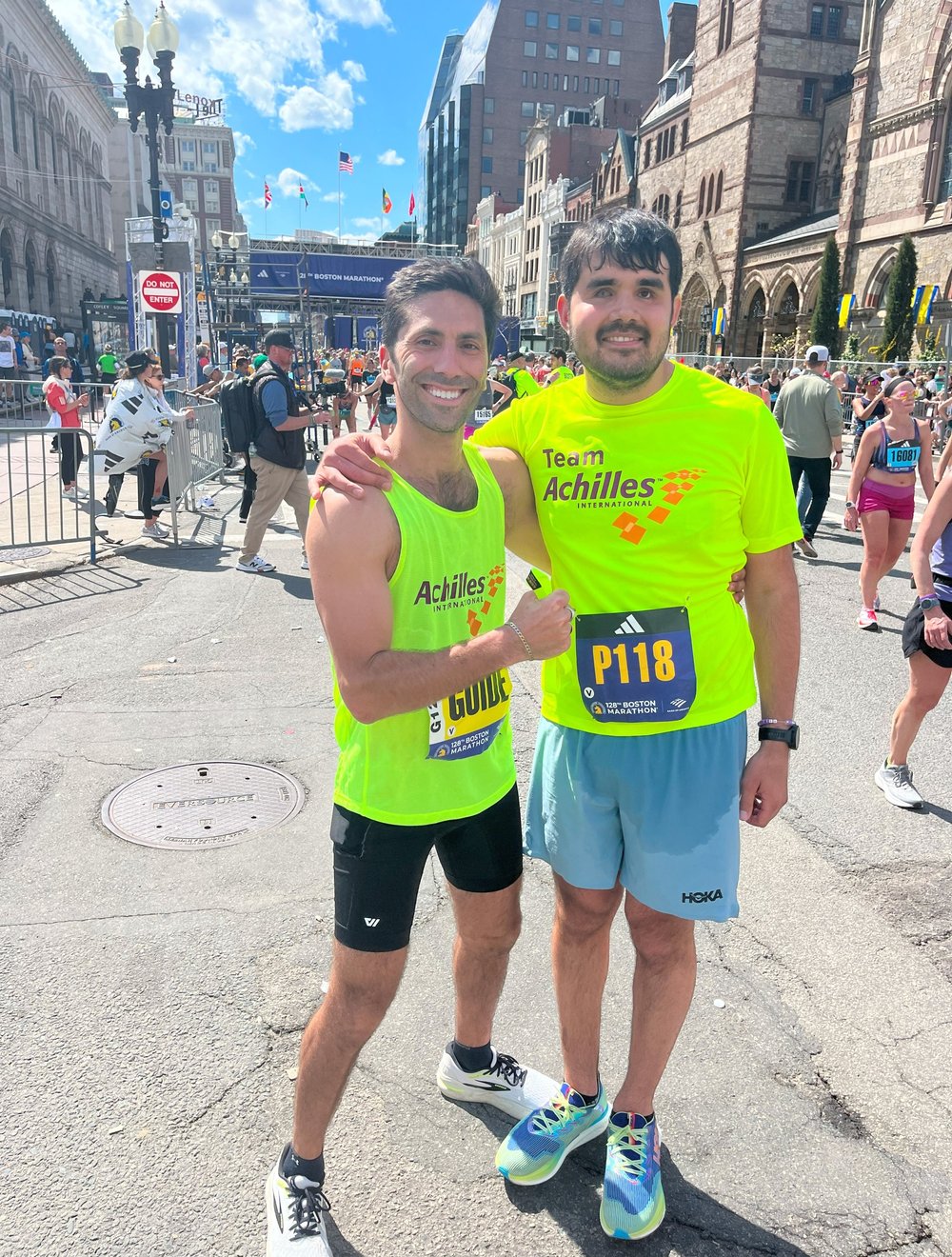  Francesco Magisano smiling with Nev Schulman at the finish line 