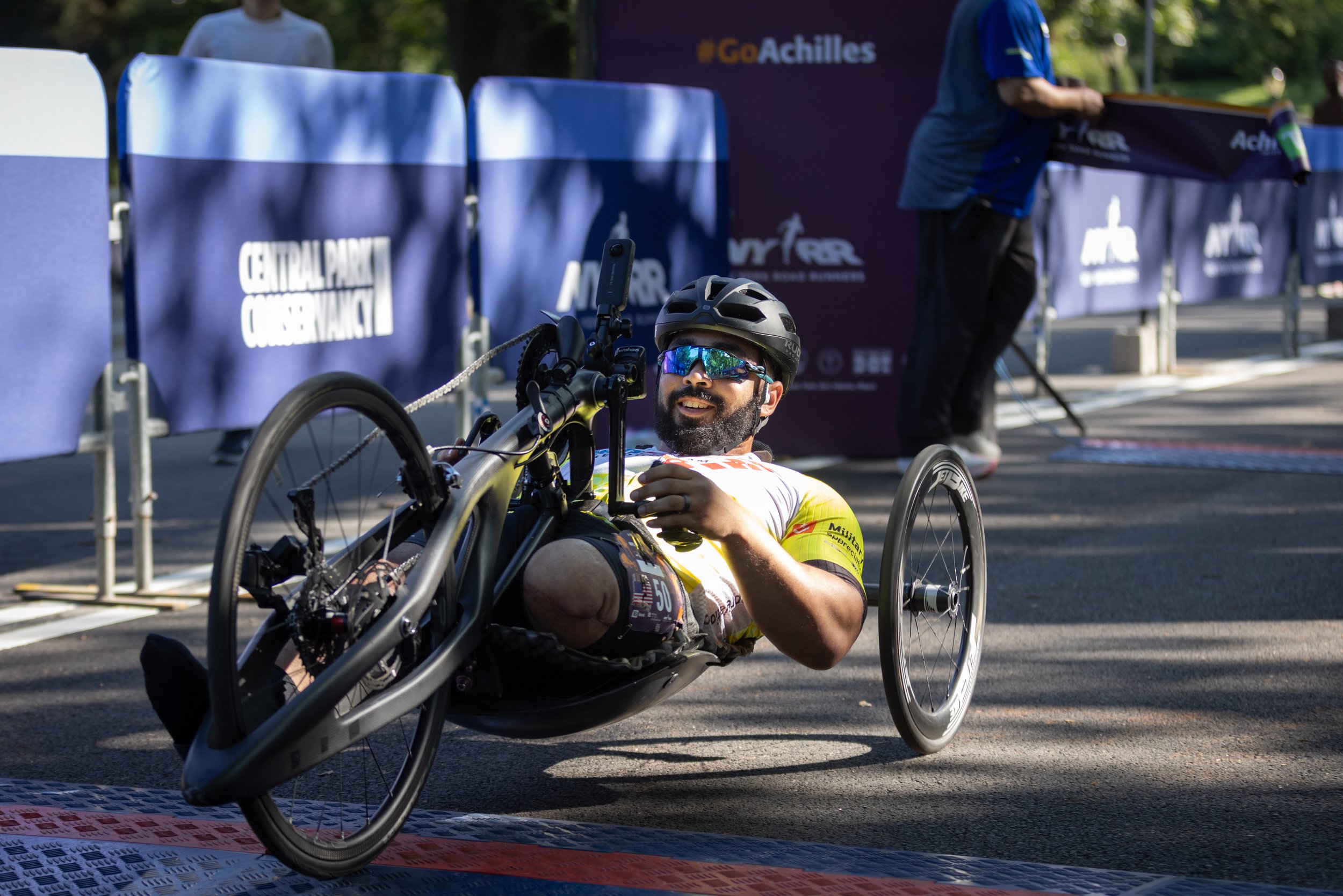 Andrew Hairston crossing the finish line.