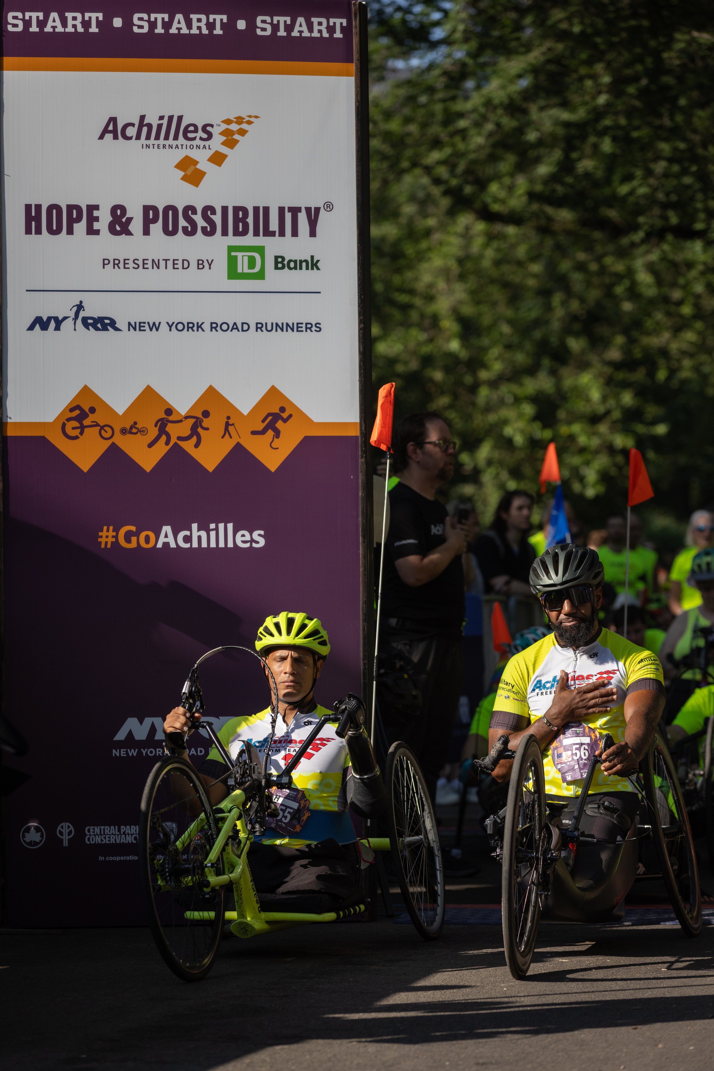 Achilles Freedom Team veterans at the start line during the national anthem.