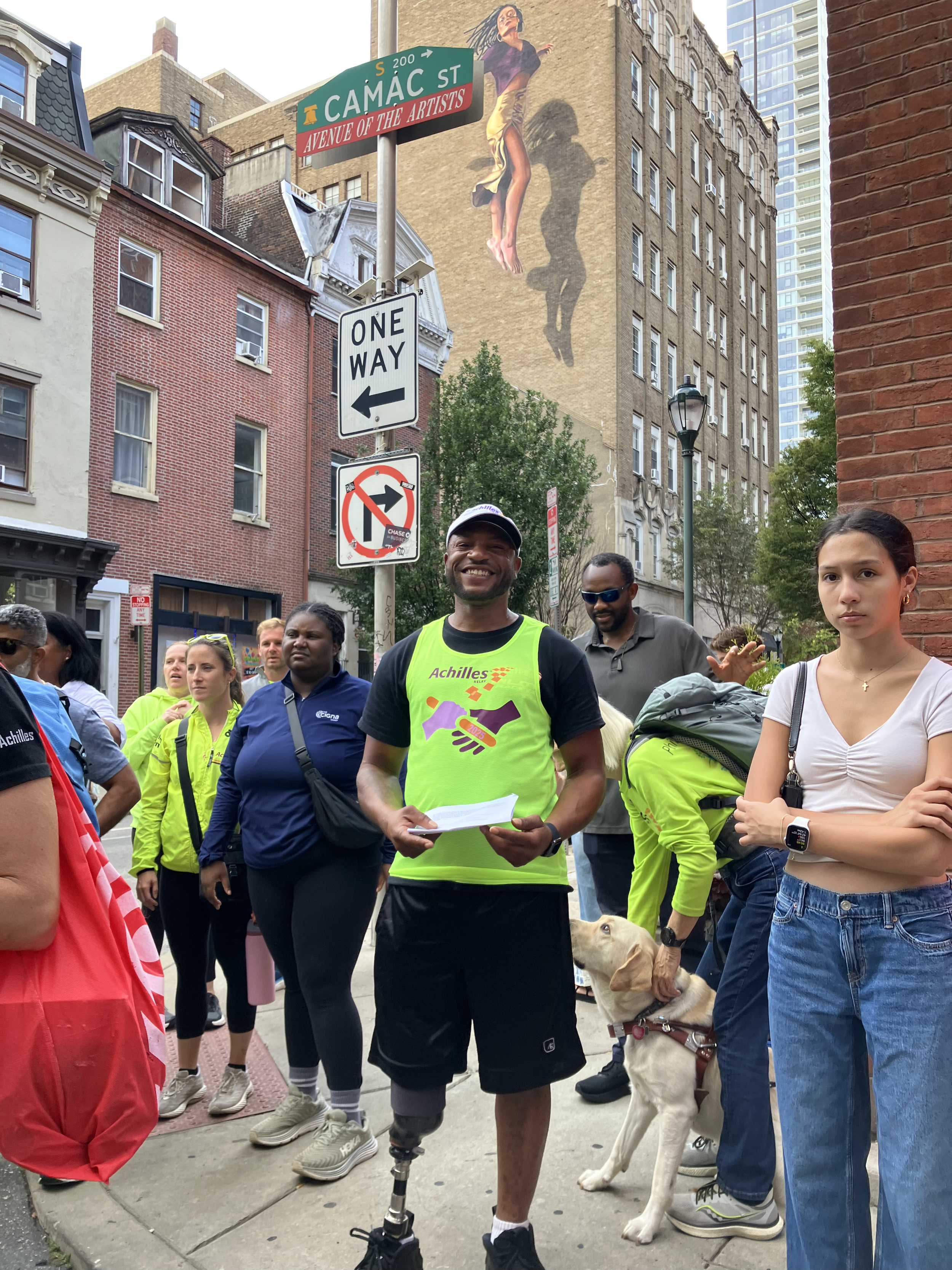Achilles Freedom Team member smiling on the streets of Philadelphia