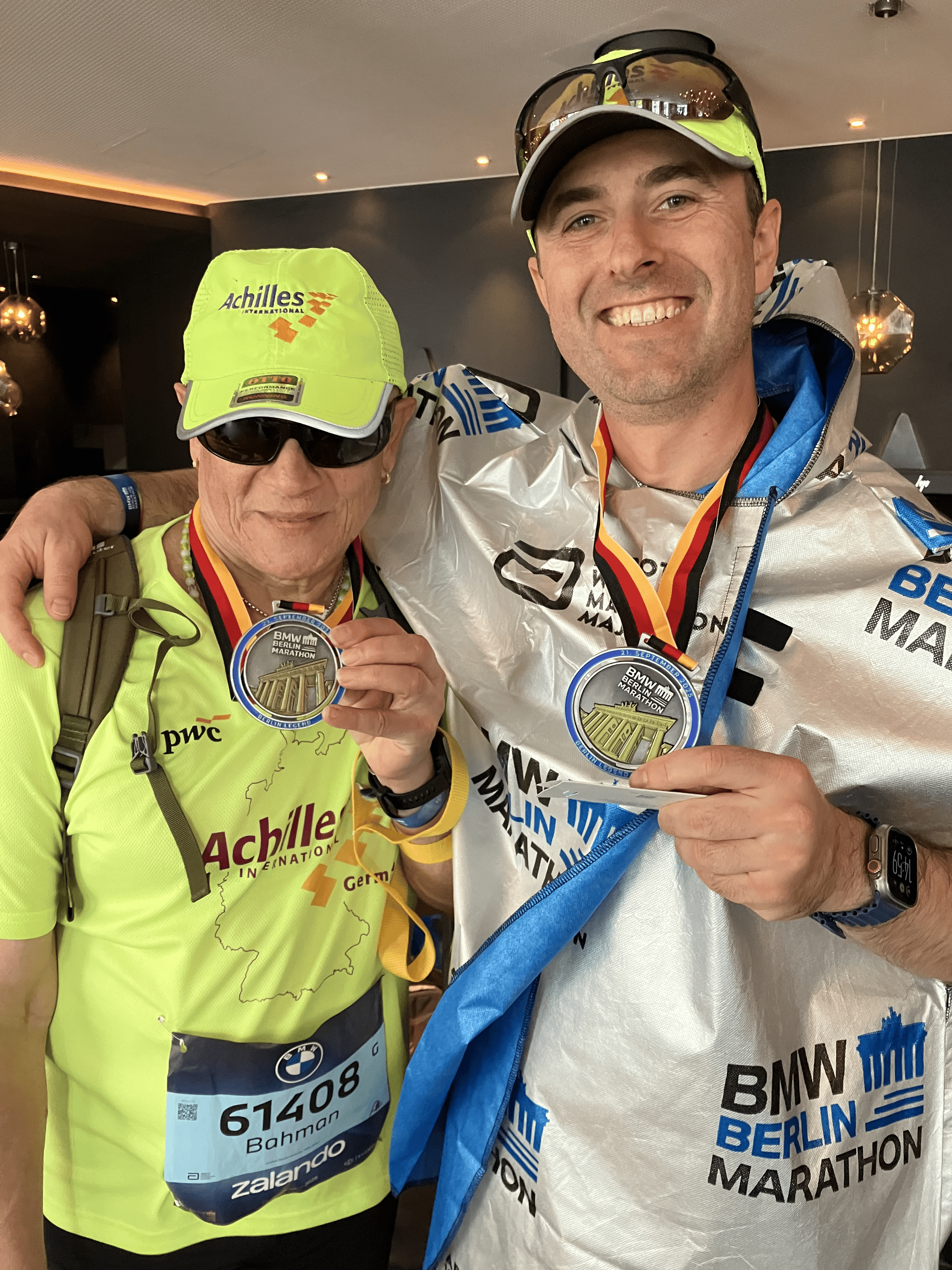  Achilles members posing with their medals.  