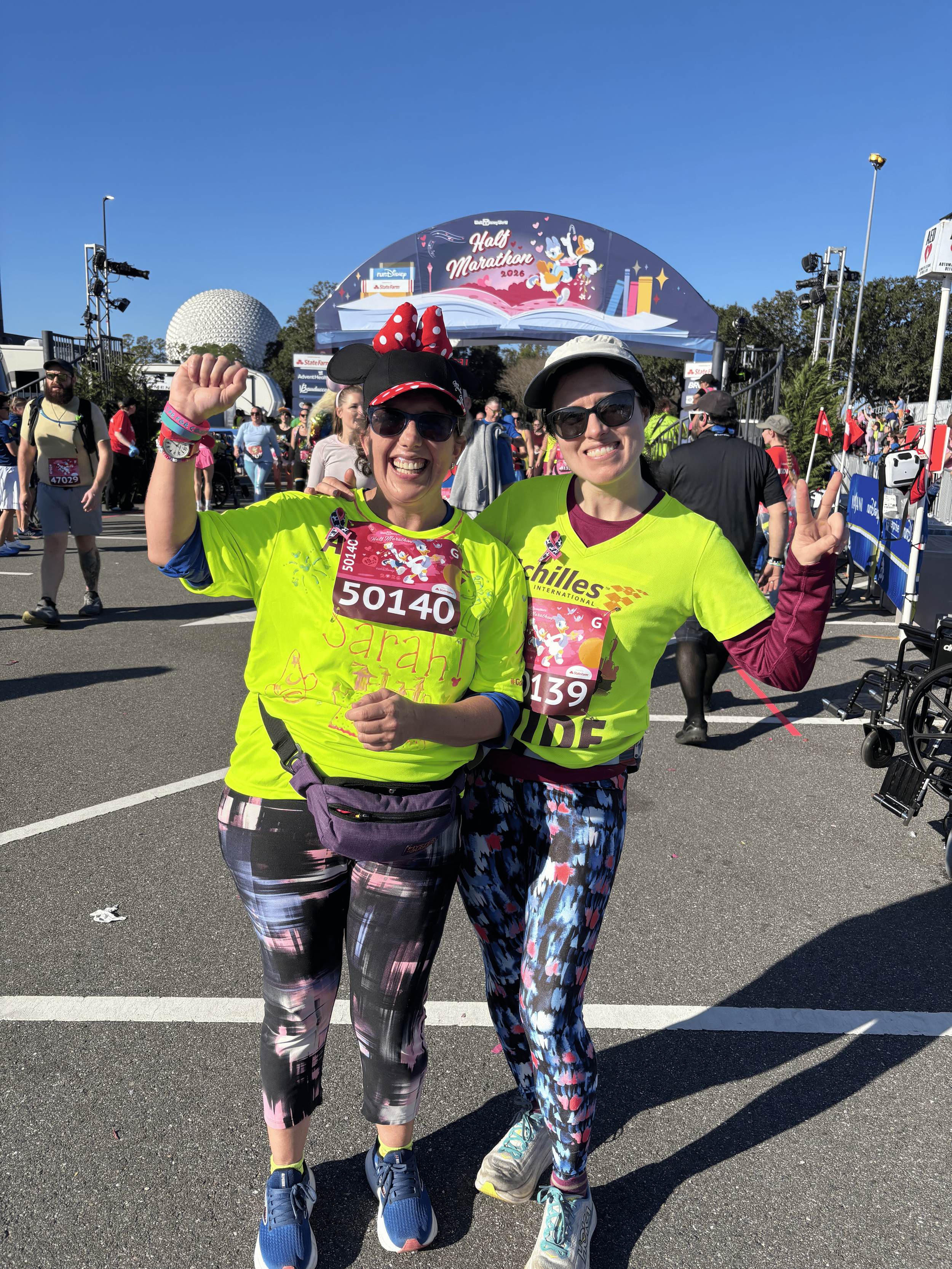  Achilles athlete posing with her guide.  