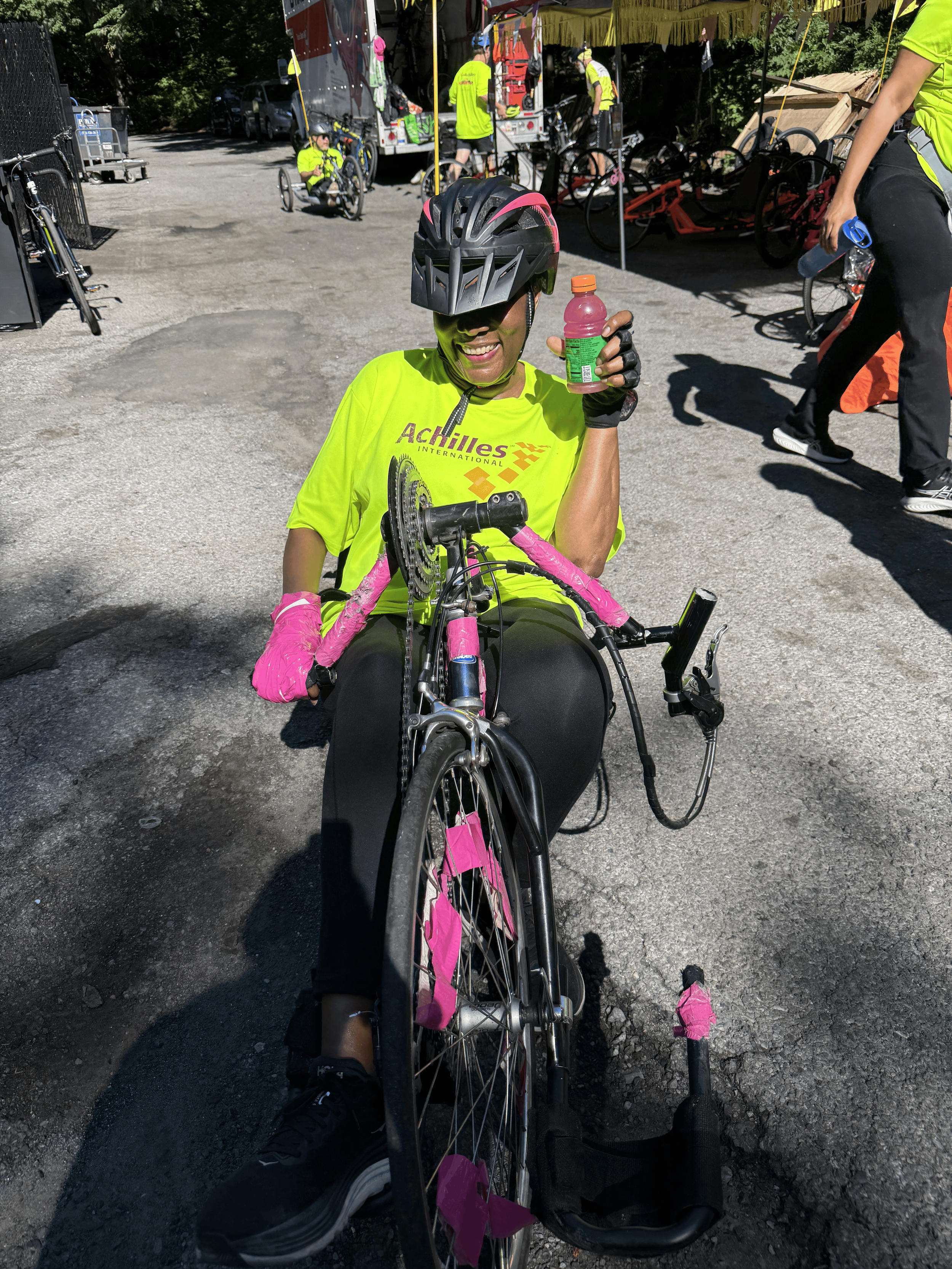  Achilles athlete posing on her handcycle.  