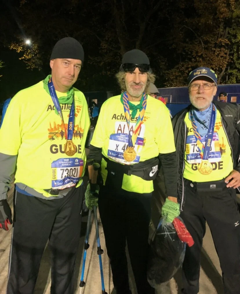  Alan and his guides at his first marathon with Achilles.  
