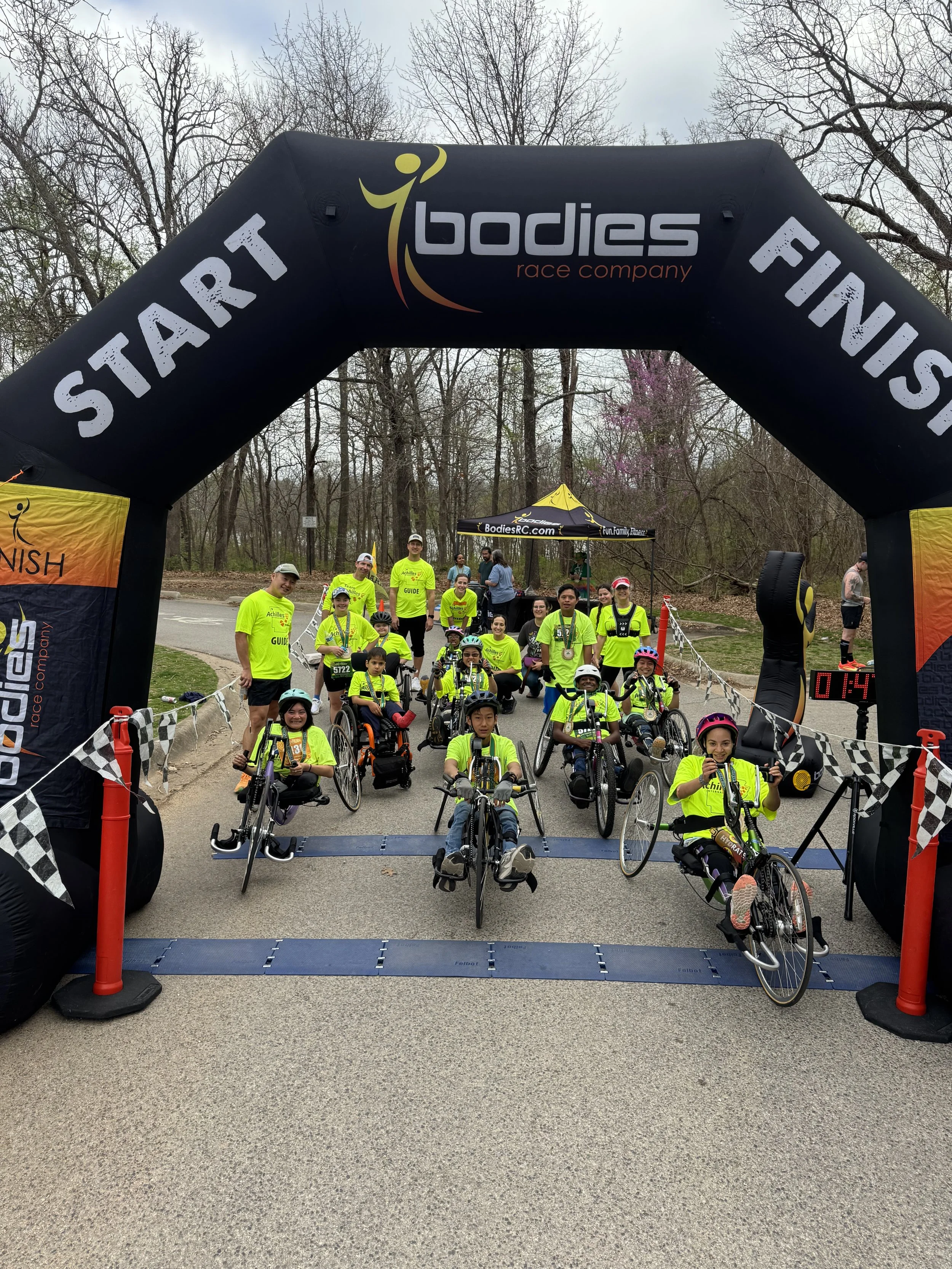  Group shot of Achilles Arkansas at the start line of a race  
