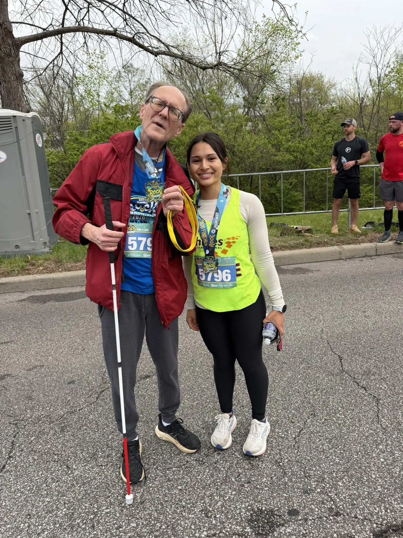  Achilles Kansas City athlete posing with their guide.  
