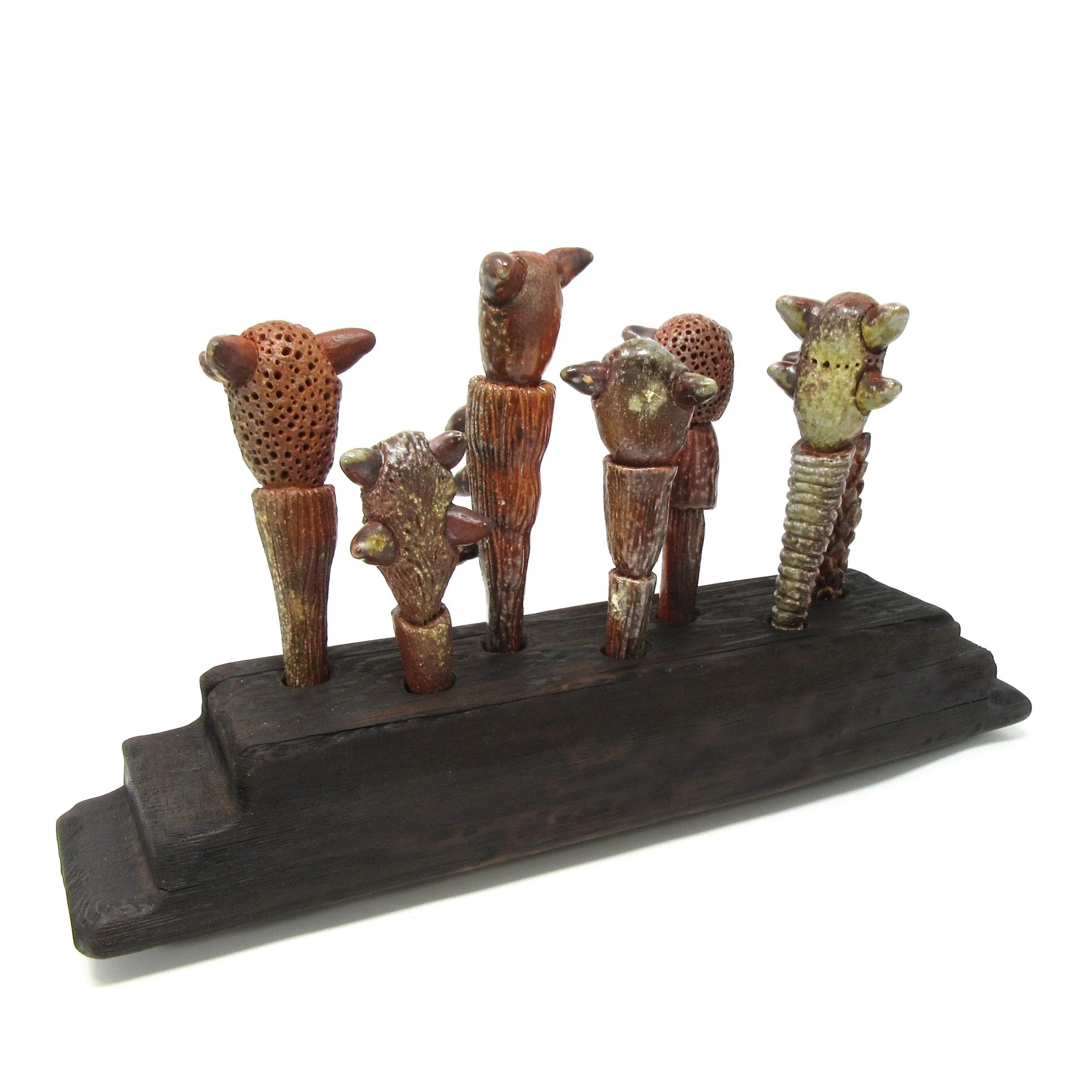 "The Champions" Wood fired stoneware in charred wood pedestal, 2022