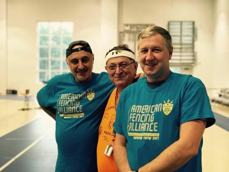 Coaches Boris Khurgin, Misha Shishovich, and Alex Fotiyev