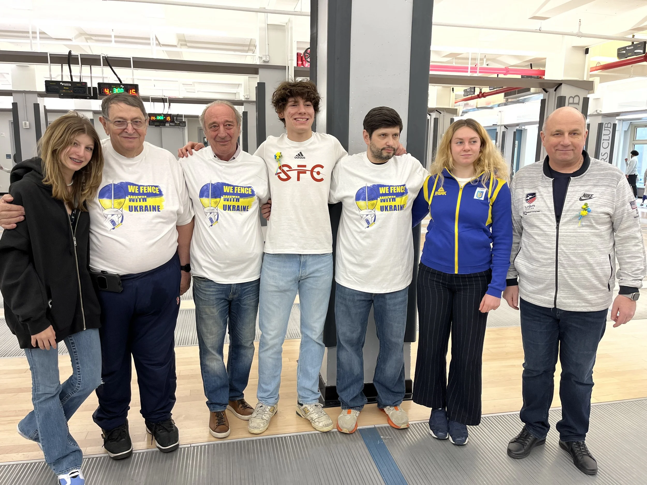 Coach Misha and Coach Igor with old and new friends