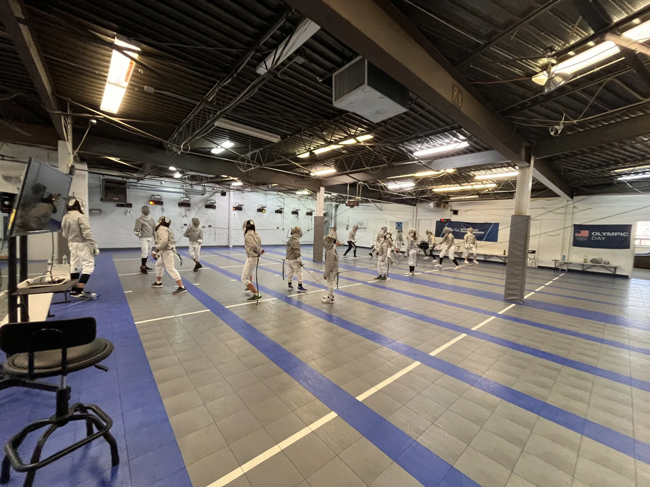Friday night practice at Allegro Fencing Center