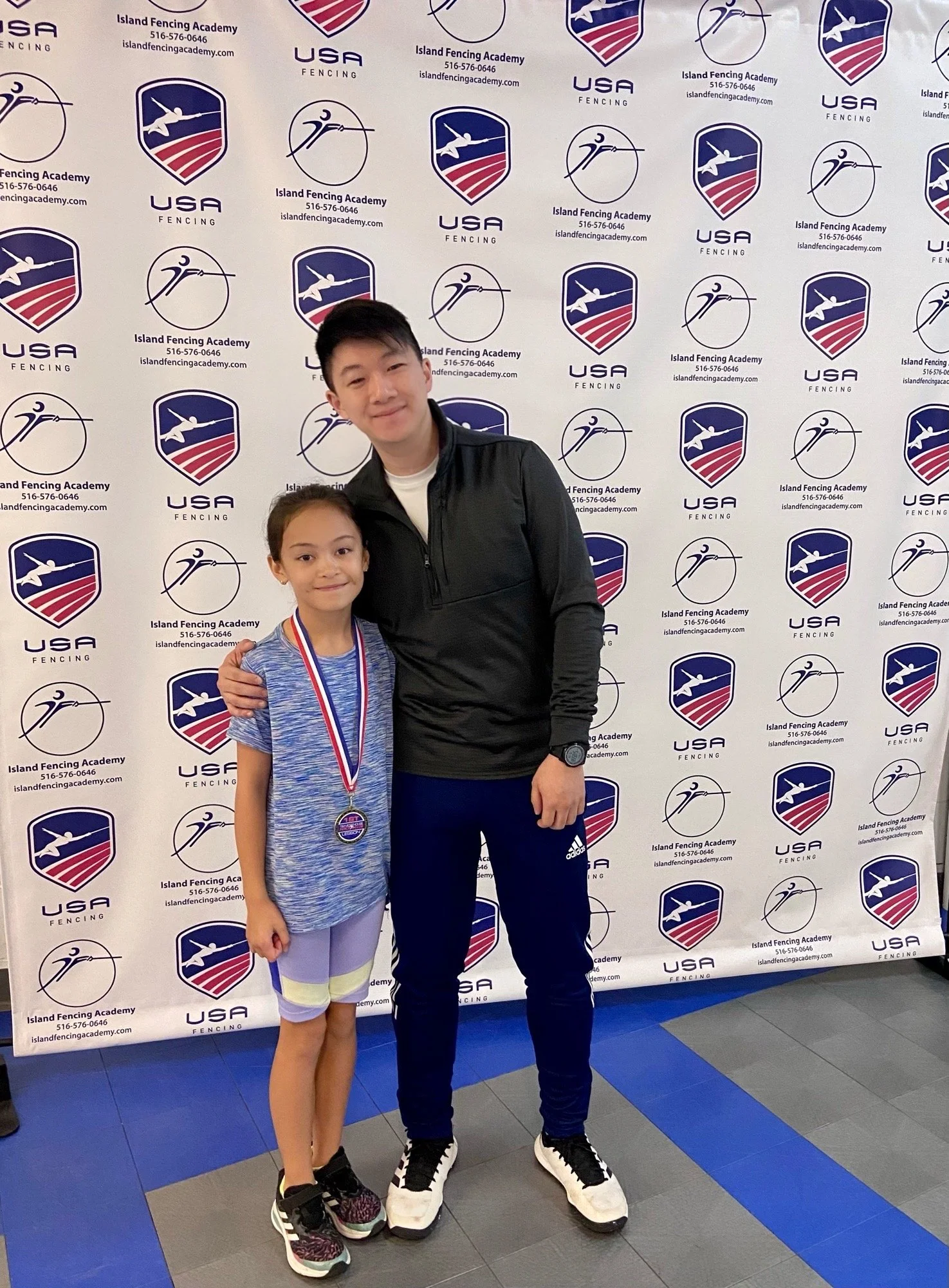 Jordanna Daniels and Coach Brian after her first Gold Medal at the Tim Morehouse Youth Cup 