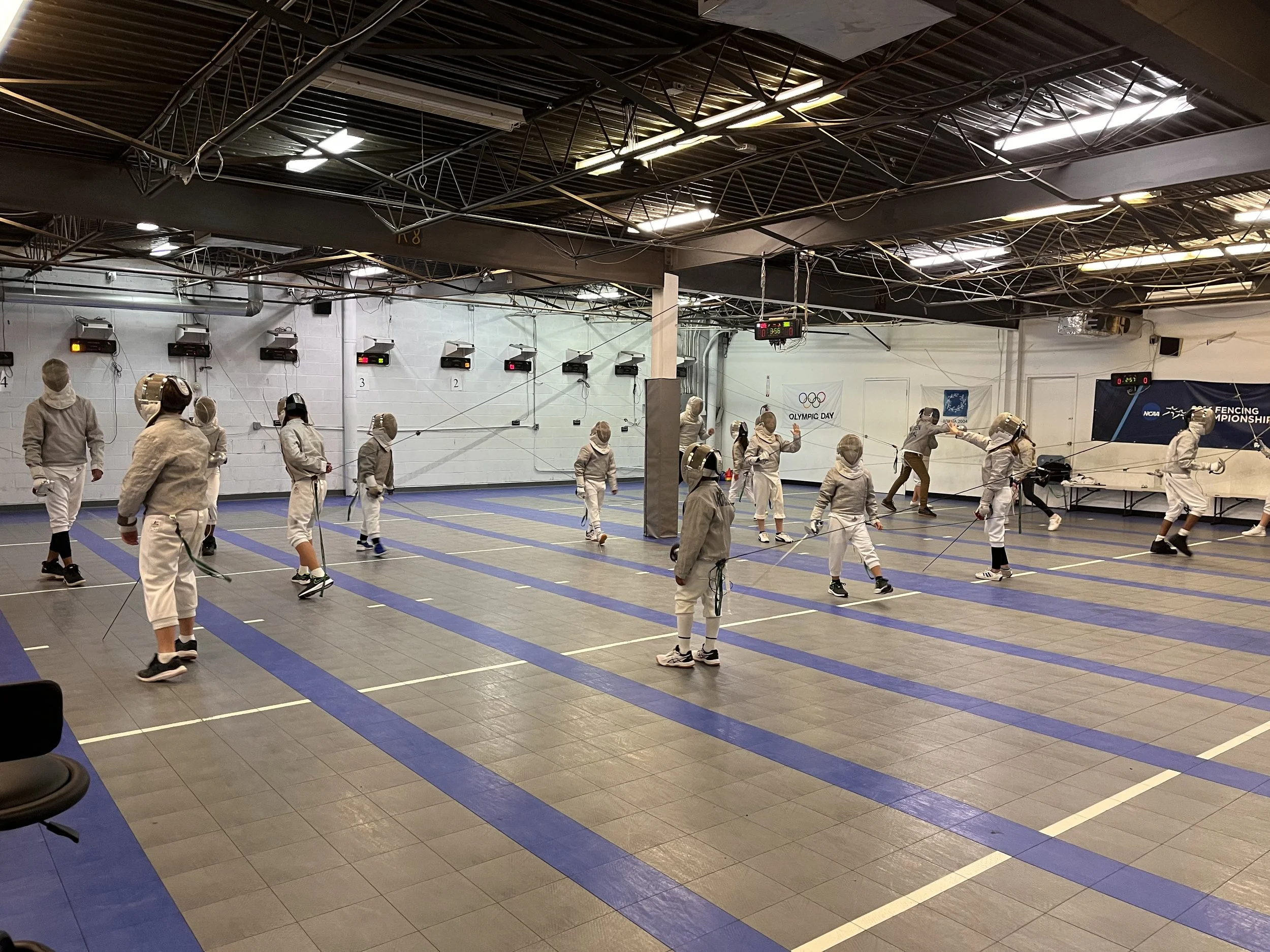 Friday night practice at Allegro Fencing Center
