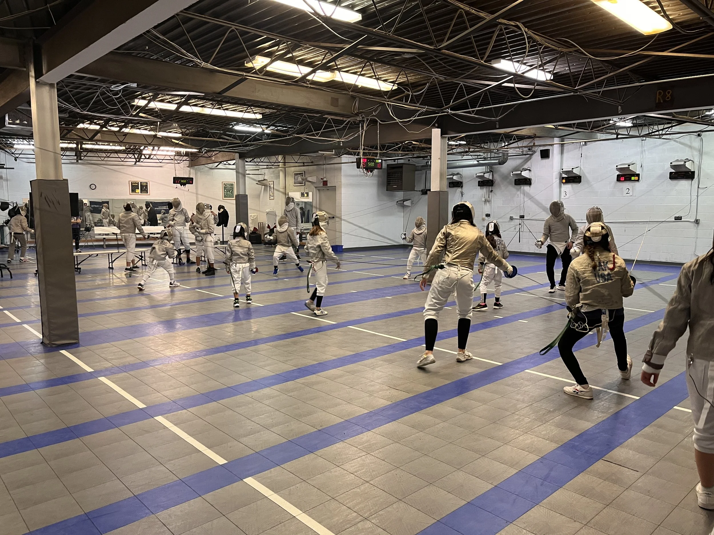 Friday night practice at Allegro Fencing Center
