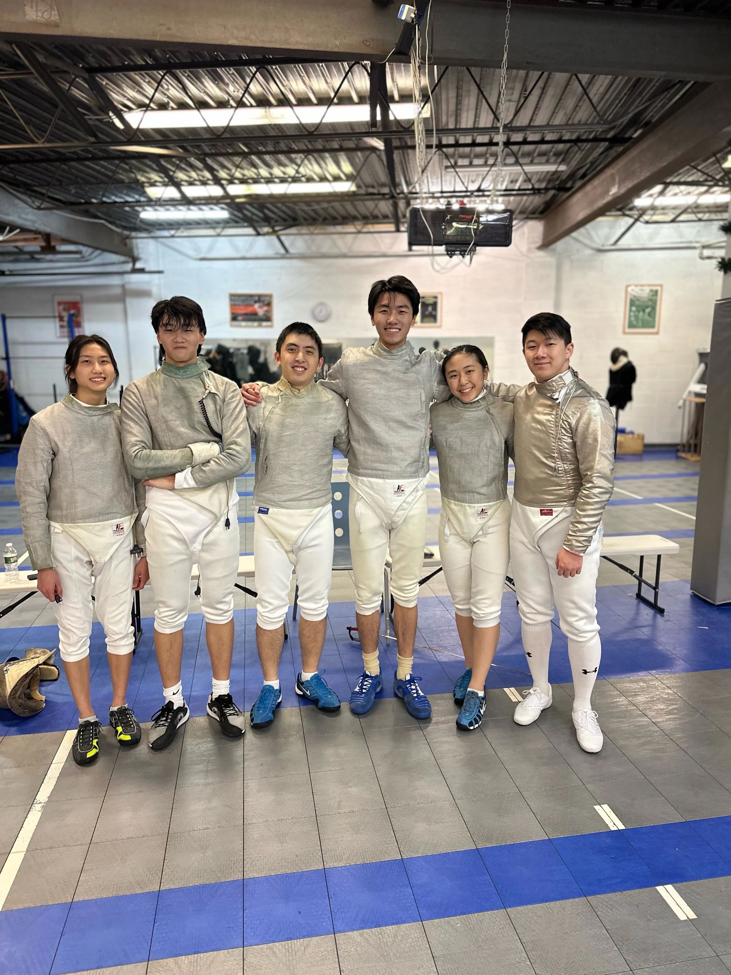 Some familiar faces! Alumni and current Allegro Fencers with Coach Brian