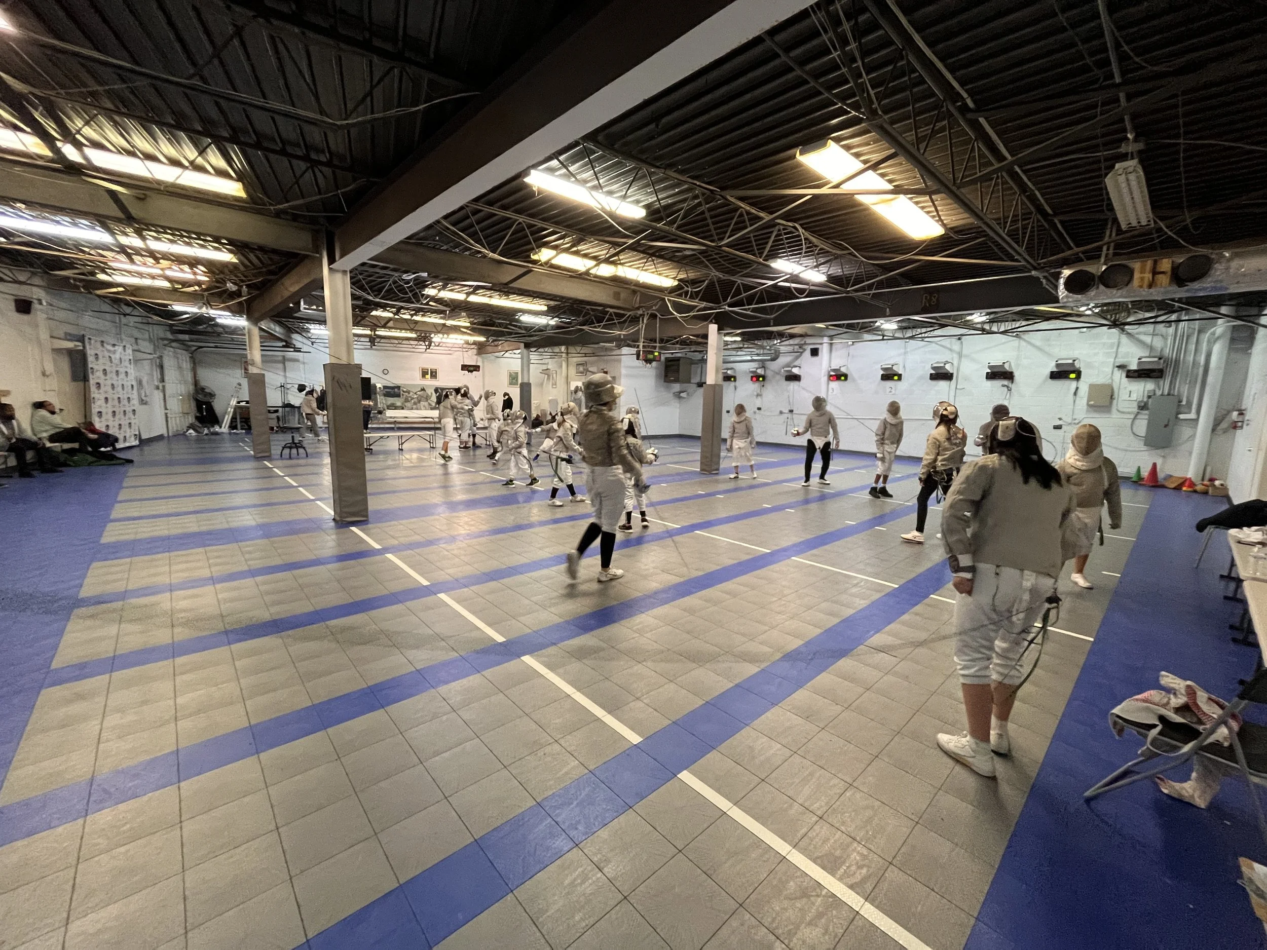 Friday night practice at Allegro Fencing Center