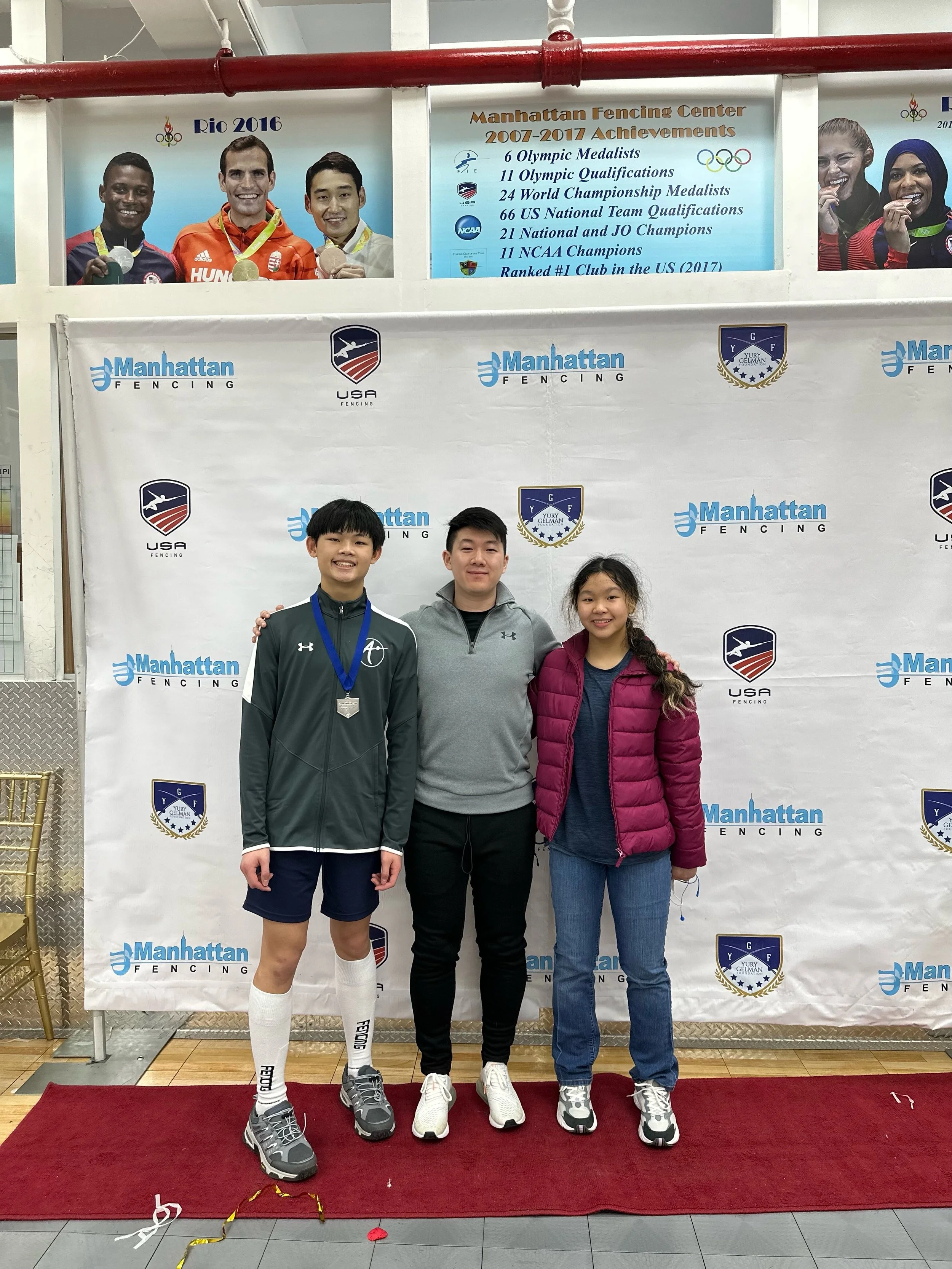 Brandon and Alexa Lim and Coach Brian at the Manhattan Liberty Cup