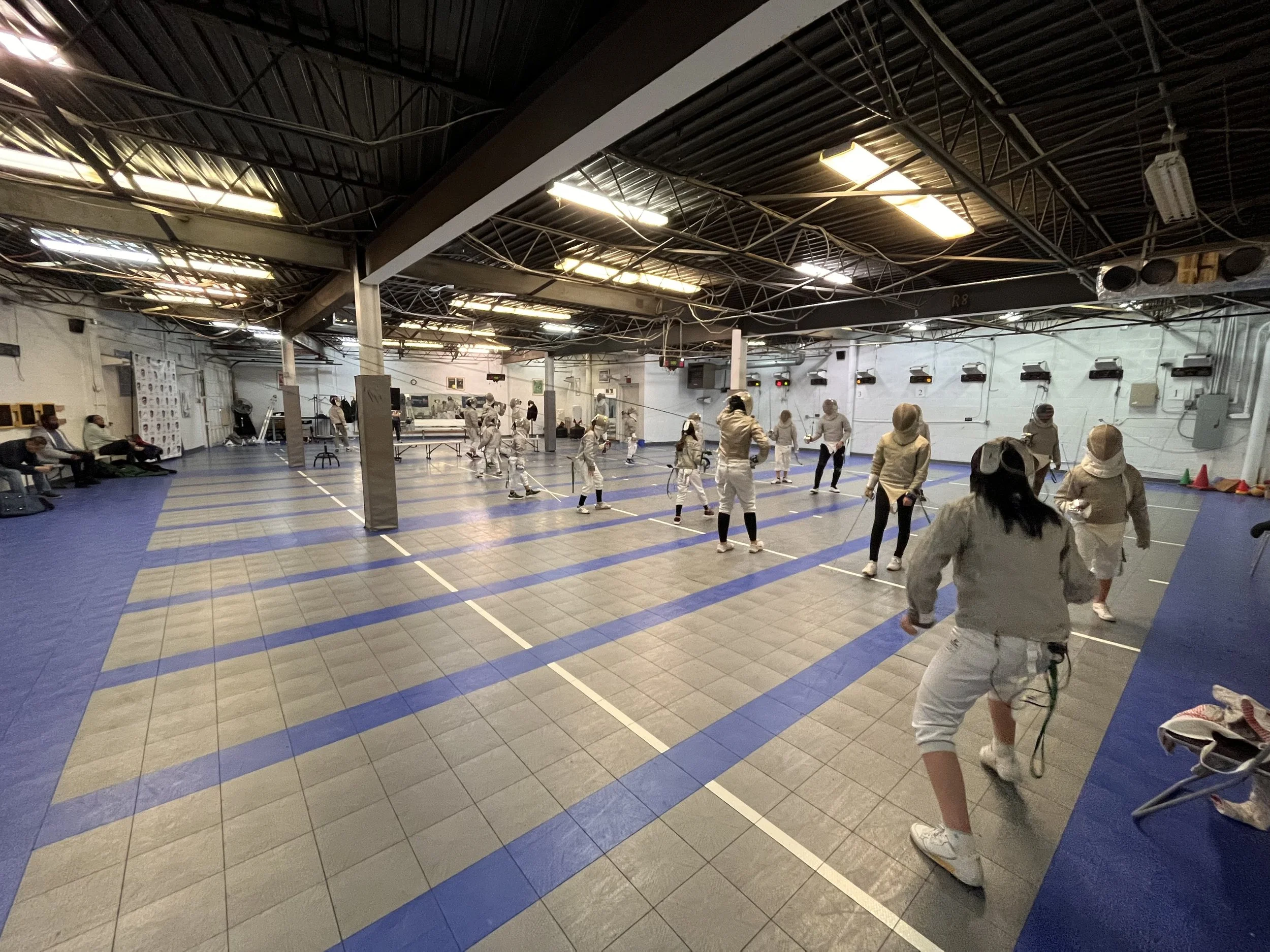 Friday night practice at Allegro Fencing Center