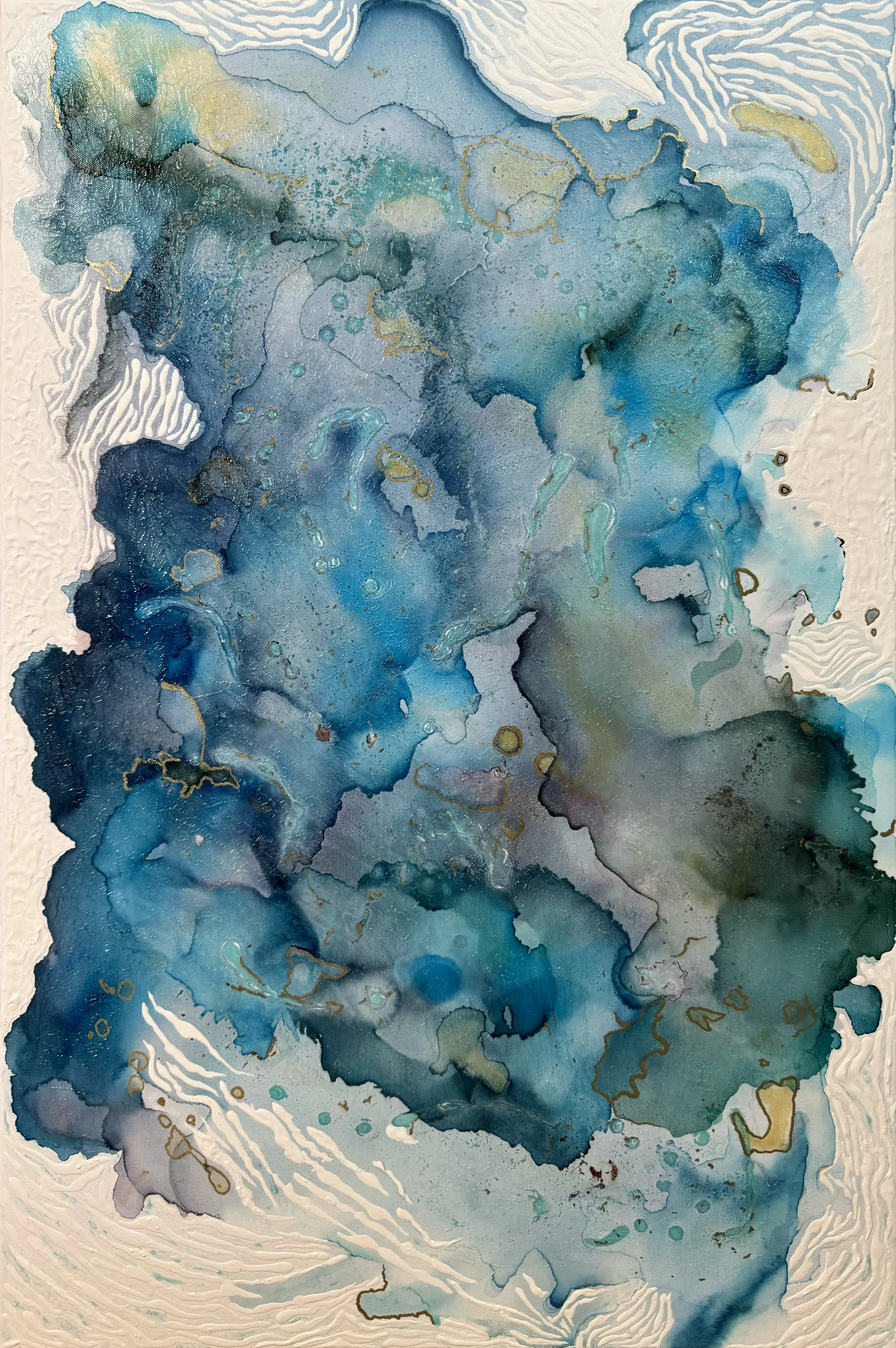 Abstract watercolor painting with various shades of blue, green, and hints of gold, featuring fluid, organic shapes and textures.