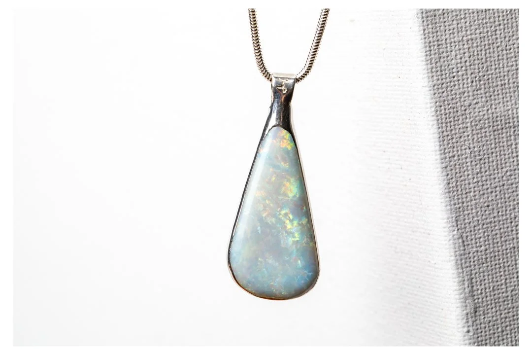 Boulder opal pendant set in pure silver 99.2 with sterling silver chain