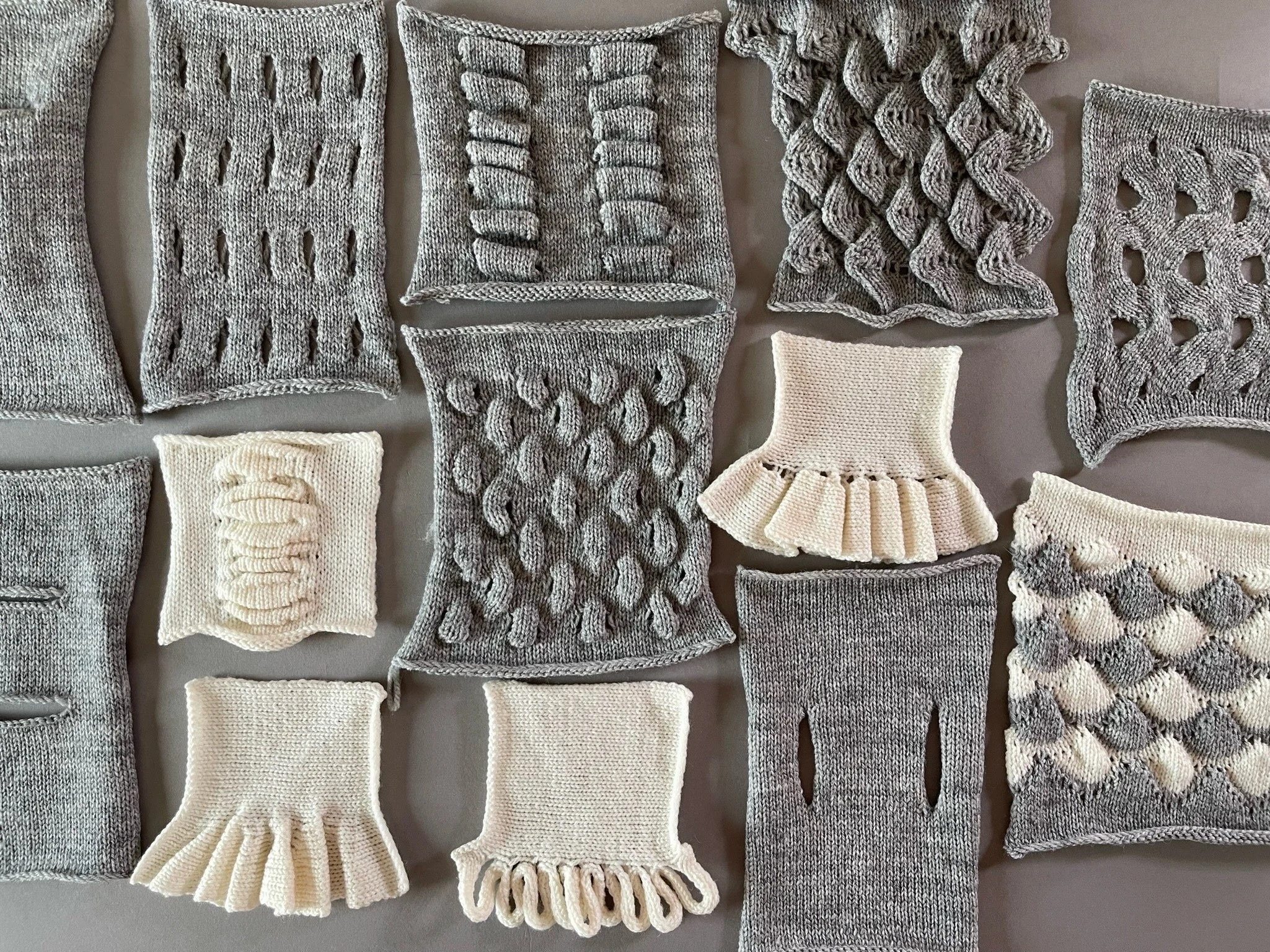 Assorted swatches of scrulptural fabrics made on a knitting machine