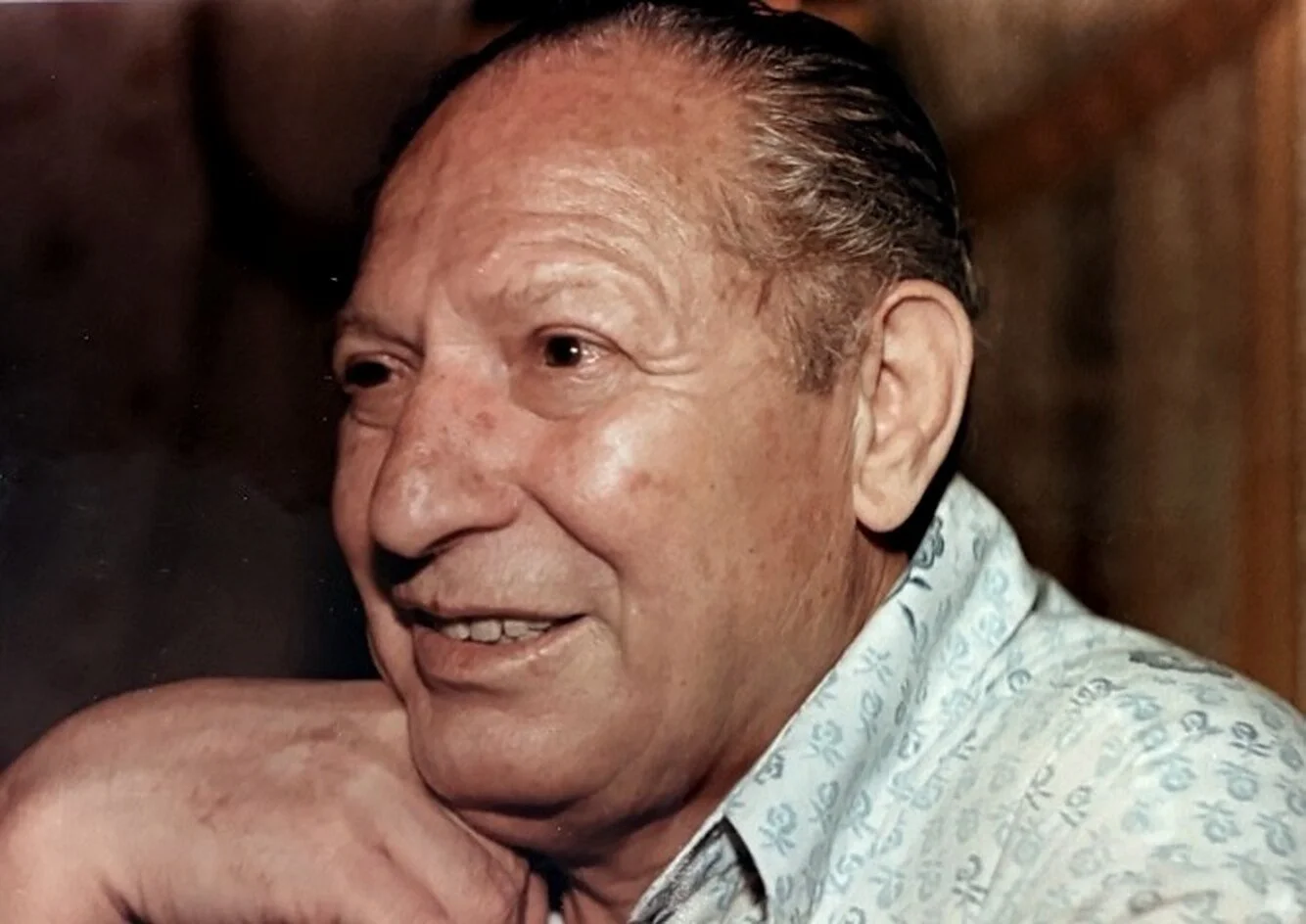 Close-up of Antonio Zeolla smiling - talking about career crafting living room furniture frames