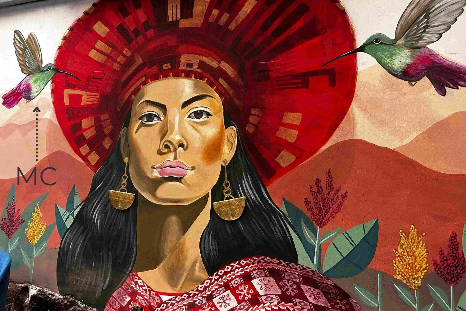 Woman wearing a large red headdress