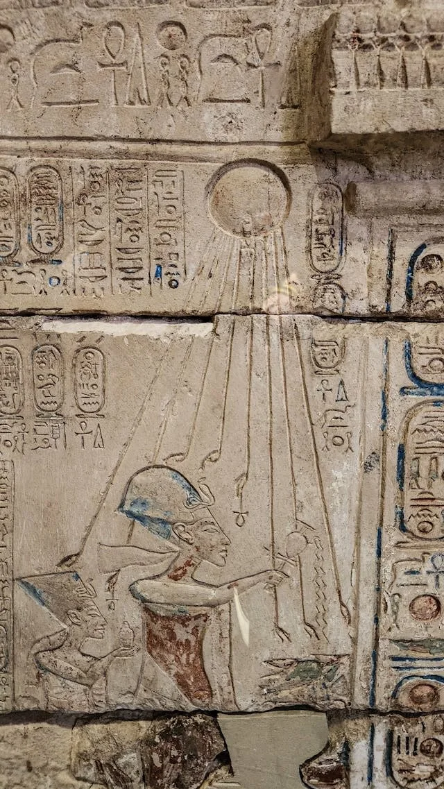 Egyptian temple scene with Isis holding an ankh, under the shining sun, symbolising the 2026 Triple-8 Lion’s Gate Portal, spiritual sovereignty, and manifestation.